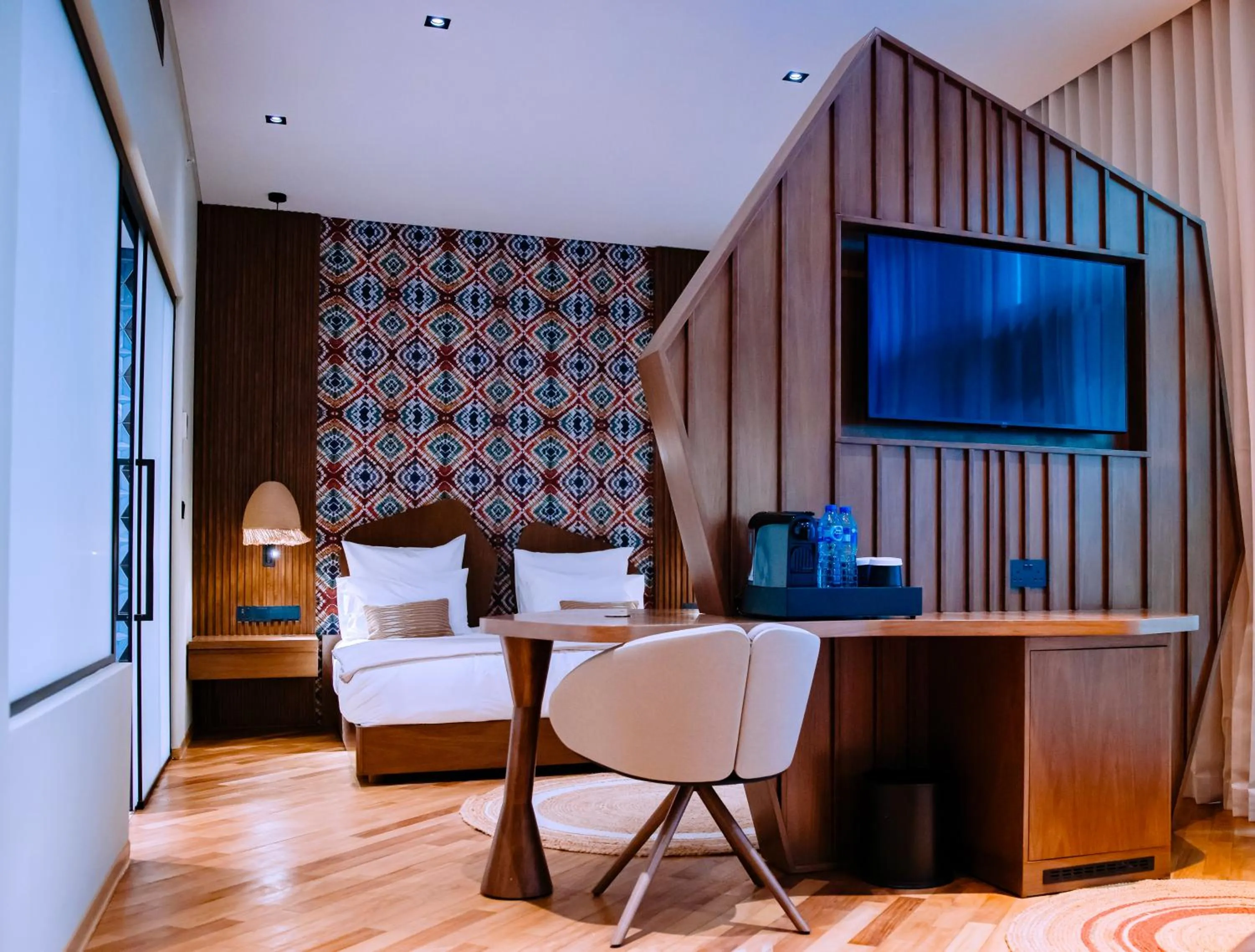 Bed in Onomo Allure Abuja AATC Hotel