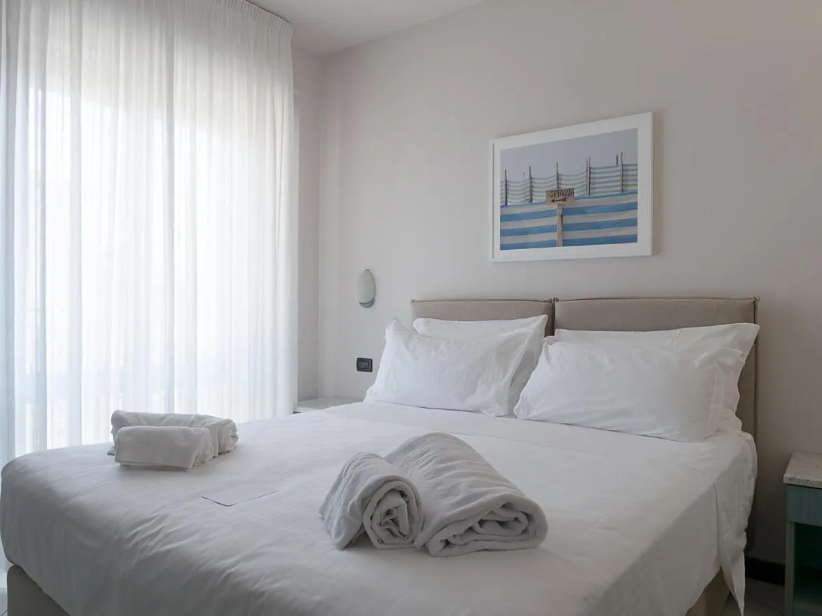 Bed in Hotel Harmony-Smile