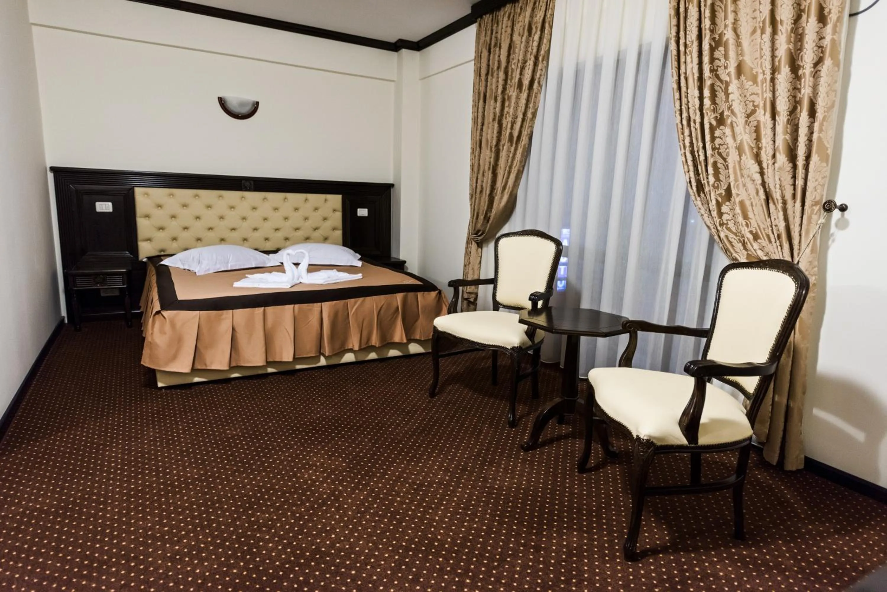 Bed in Pensiunea Iriss