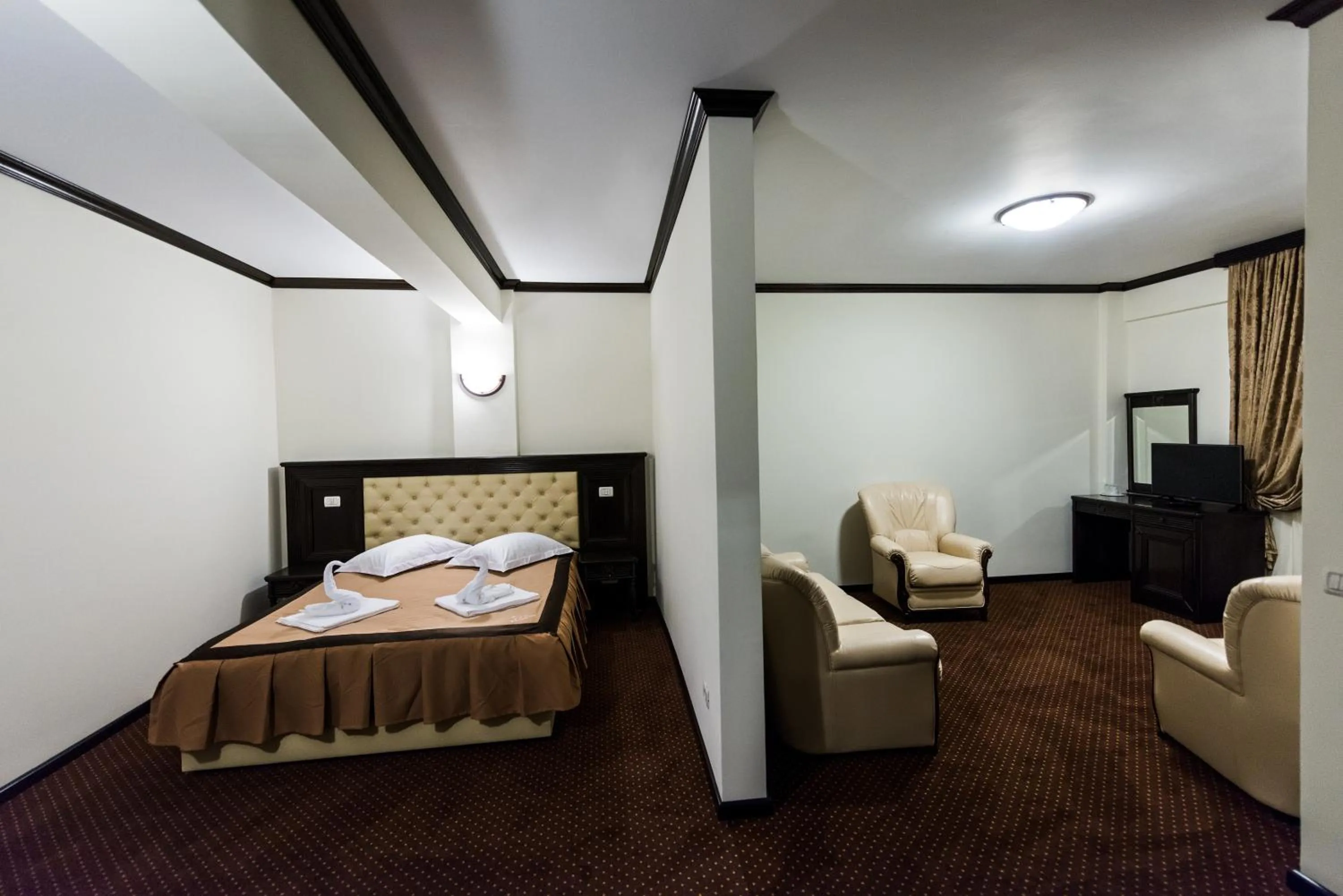 Bed in Pensiunea Iriss