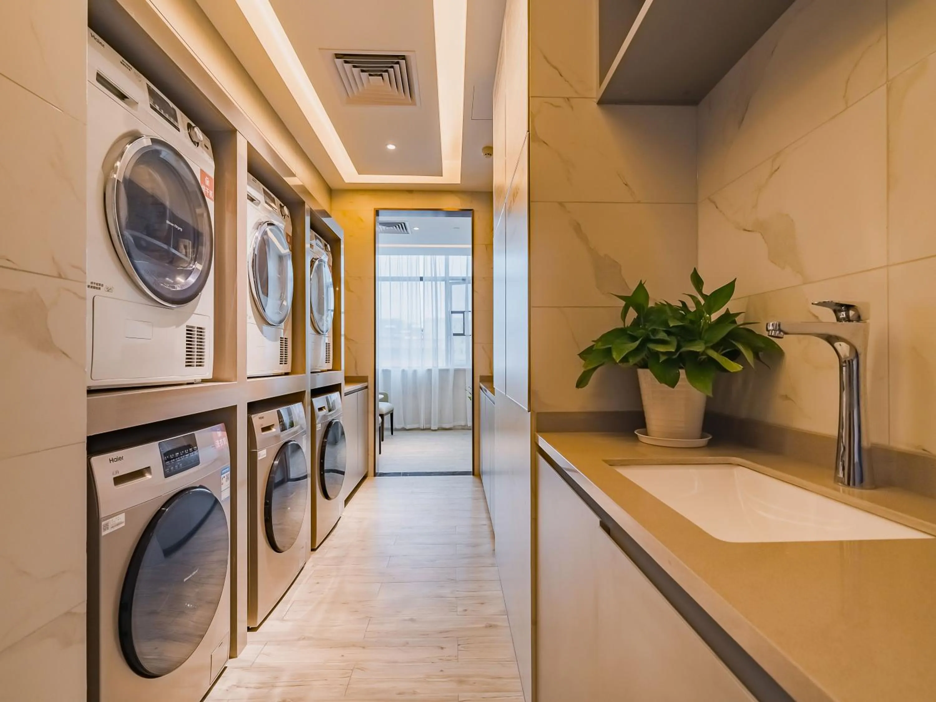 washing machine in Metropolo Hotel Guangzhou Hanxi Chimelong Wanbo Subway Station