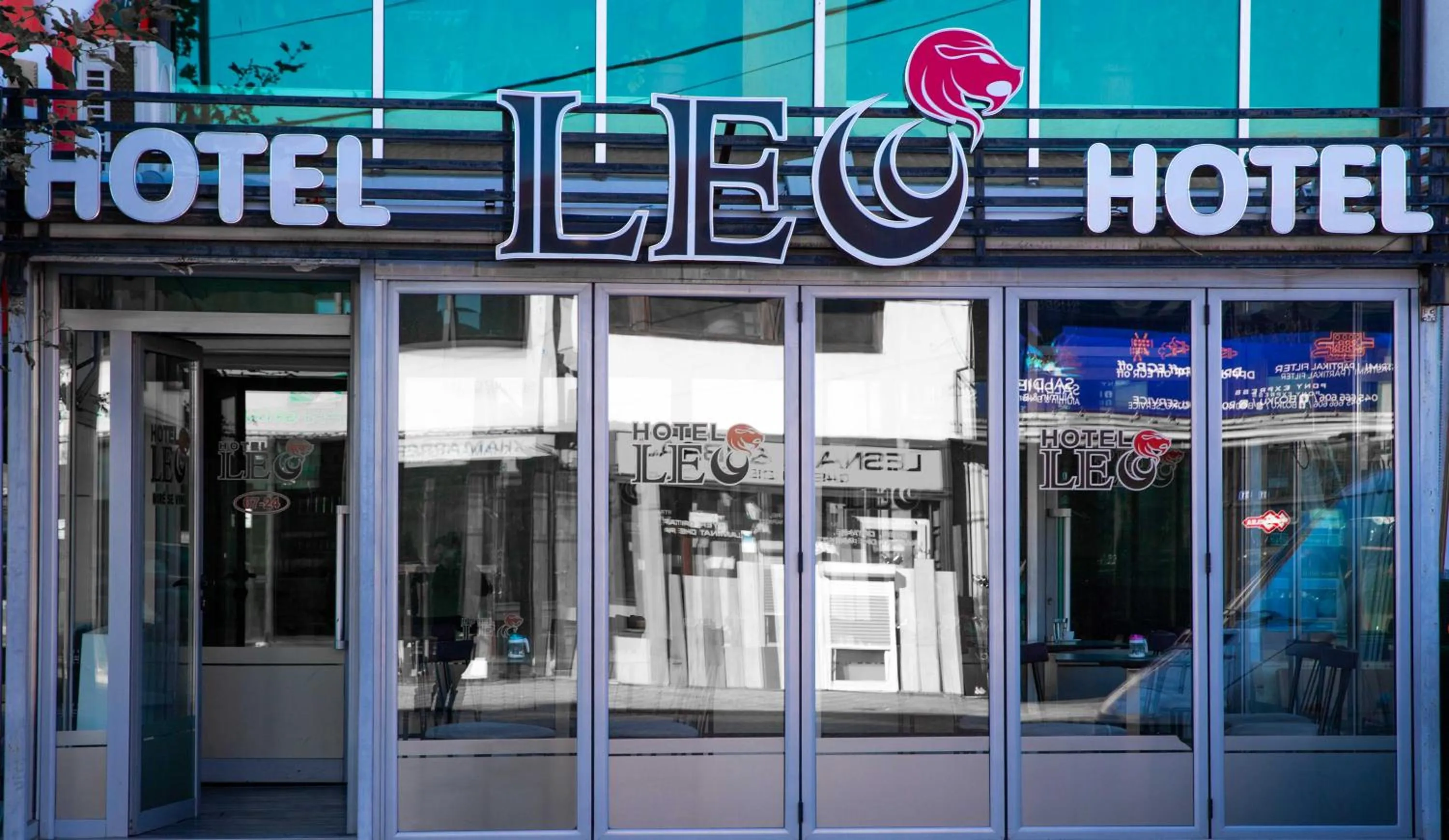 Property logo or sign in Hotel Leo