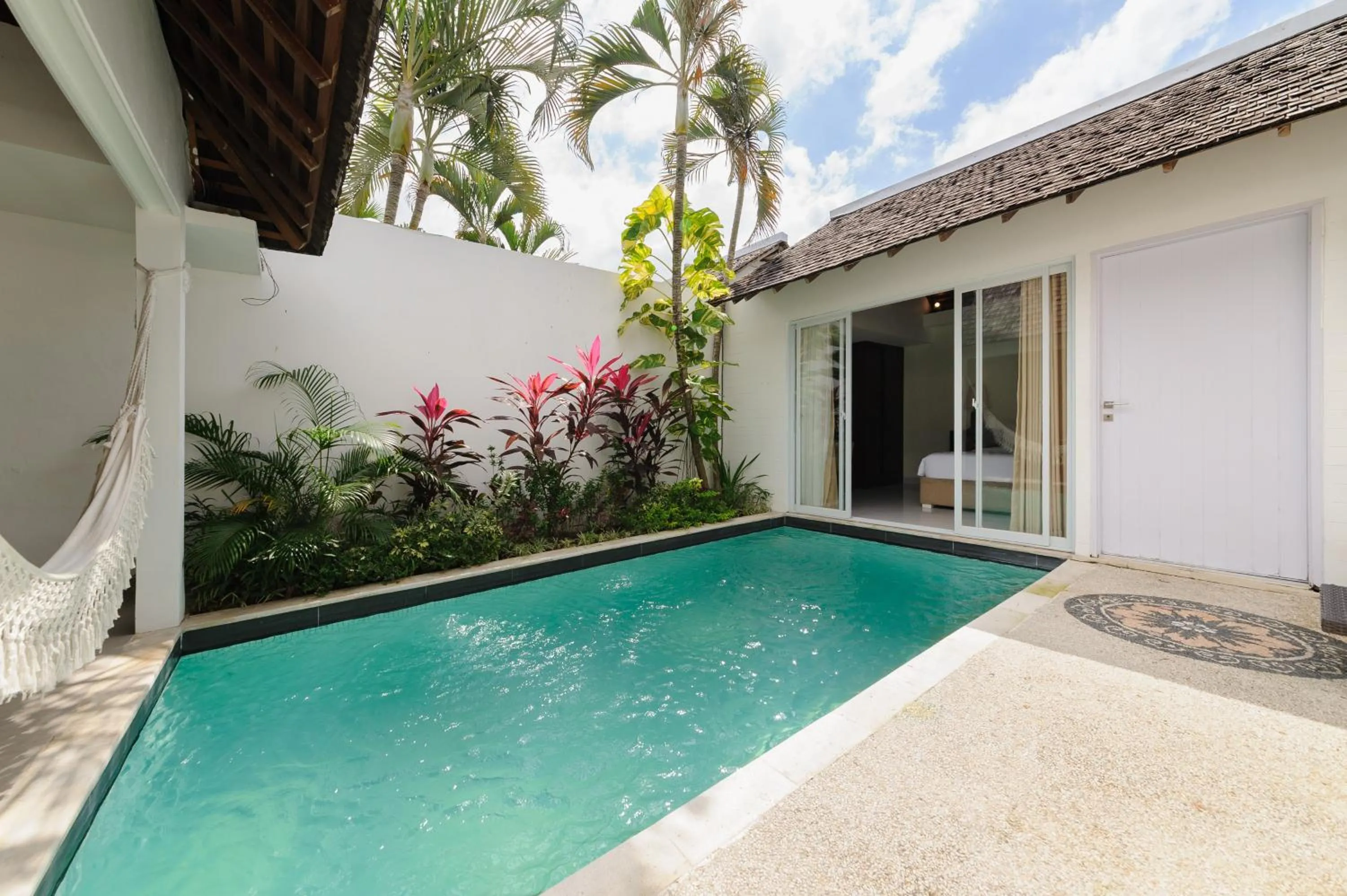 Swimming pool in Tan's Astana Villa's by The Lavana