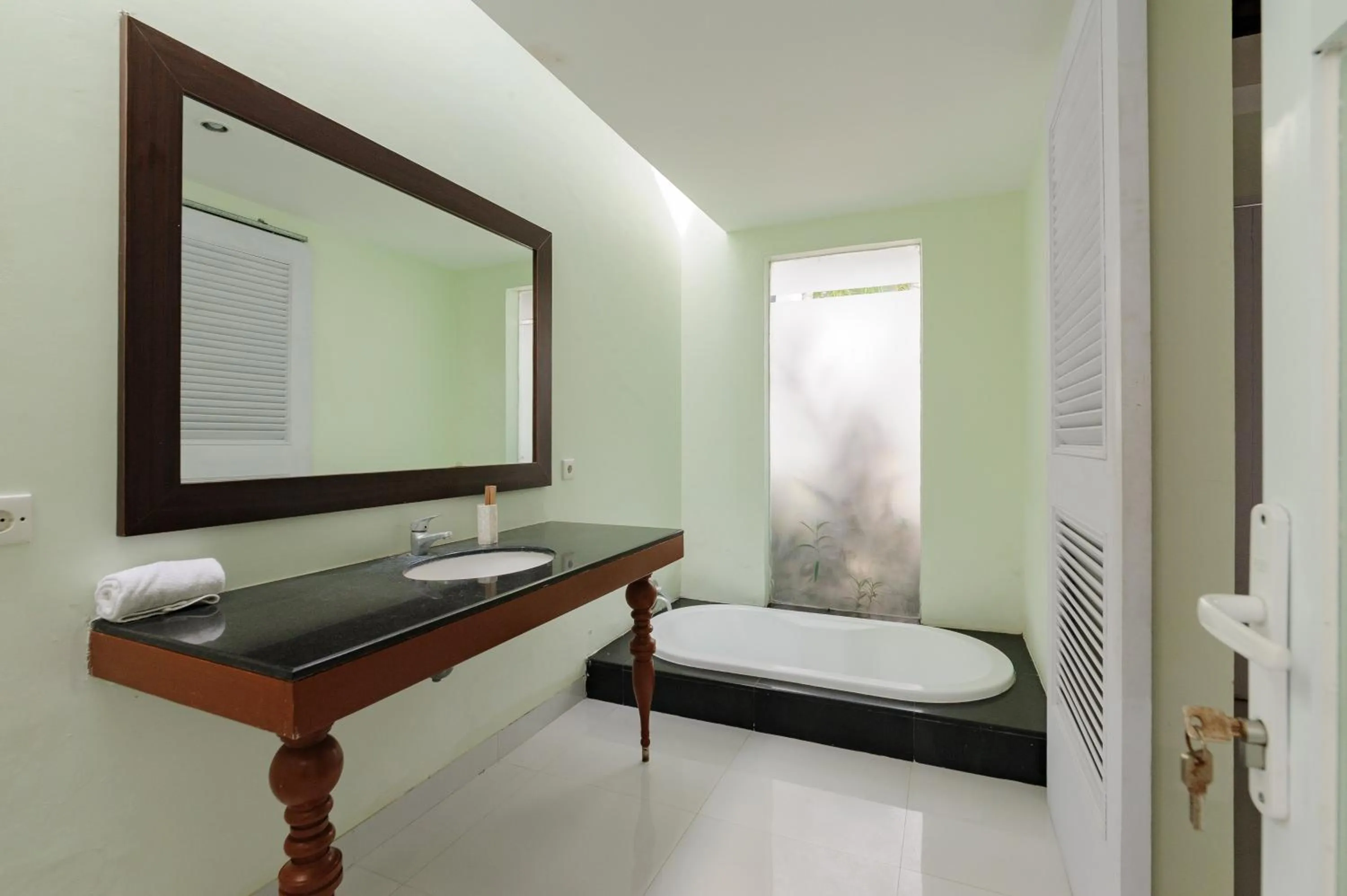 Bathroom in Tan's Astana Villa's by The Lavana