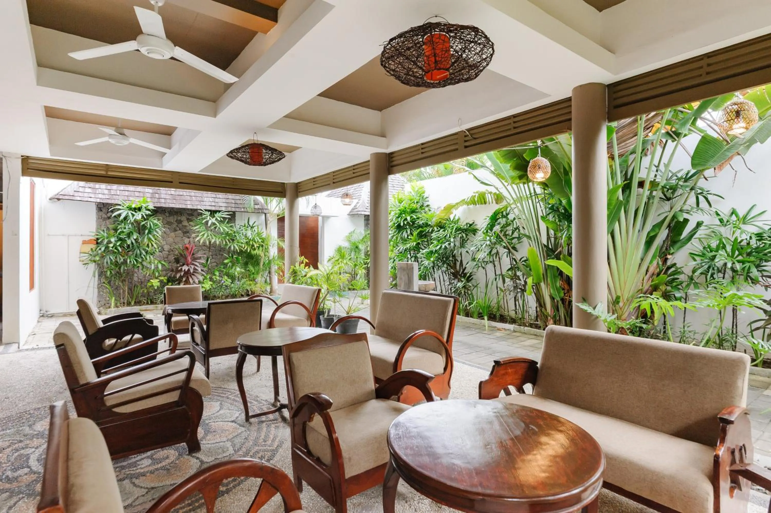Seating area in Tan's Astana Villa's by The Lavana
