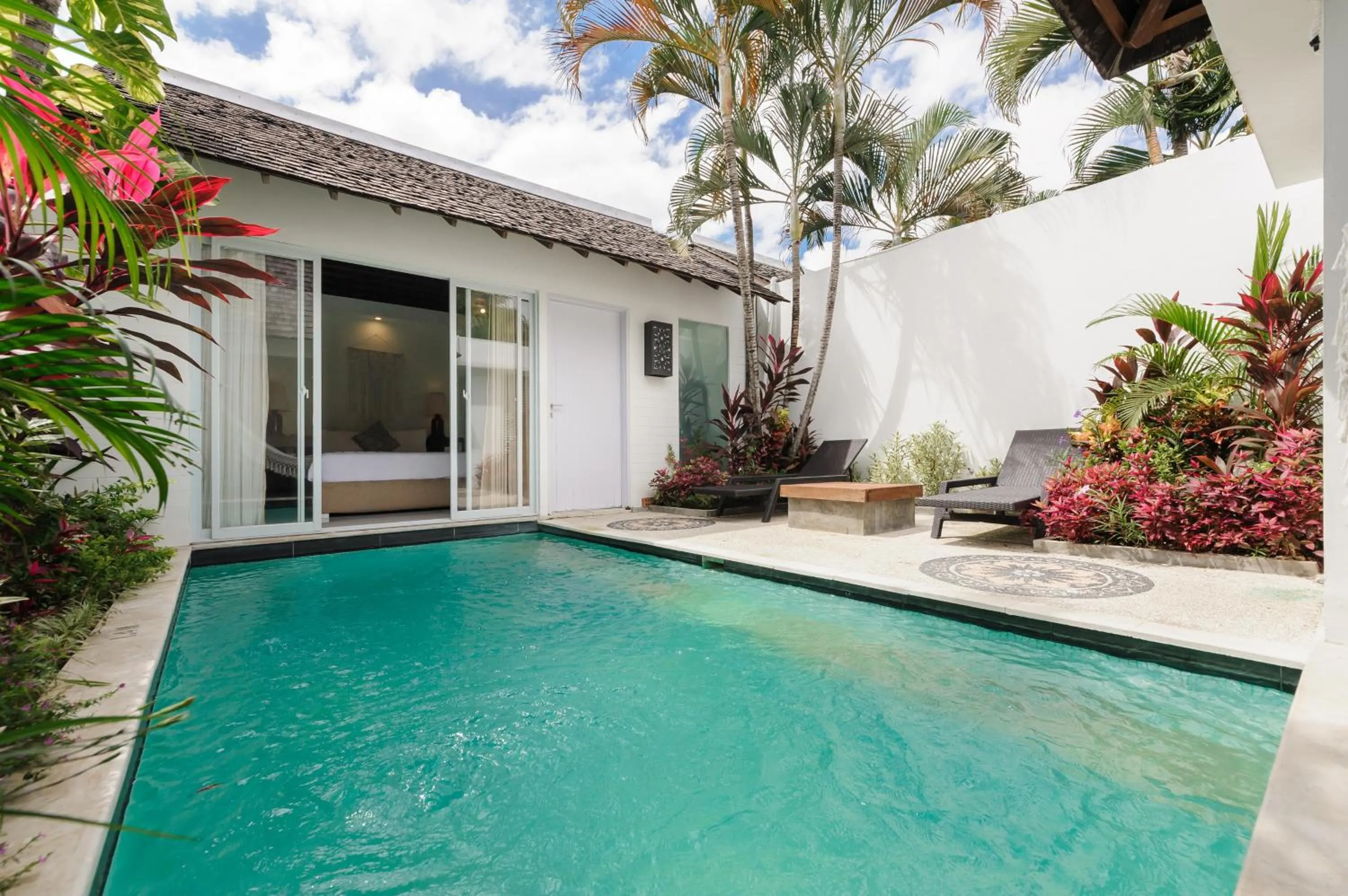 Swimming pool in Tan's Astana Villa's by The Lavana
