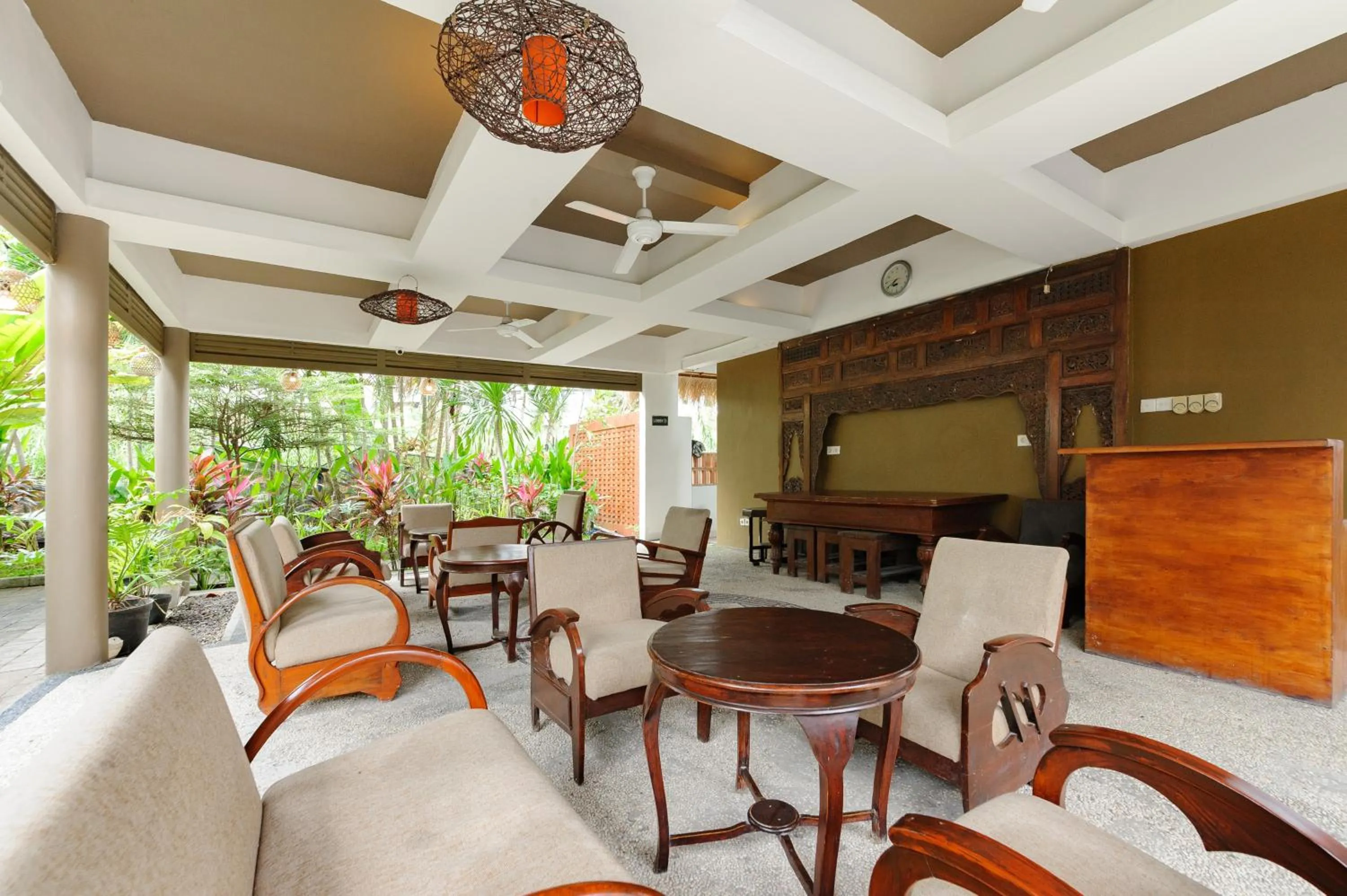 Seating area in Tan's Astana Villa's by The Lavana