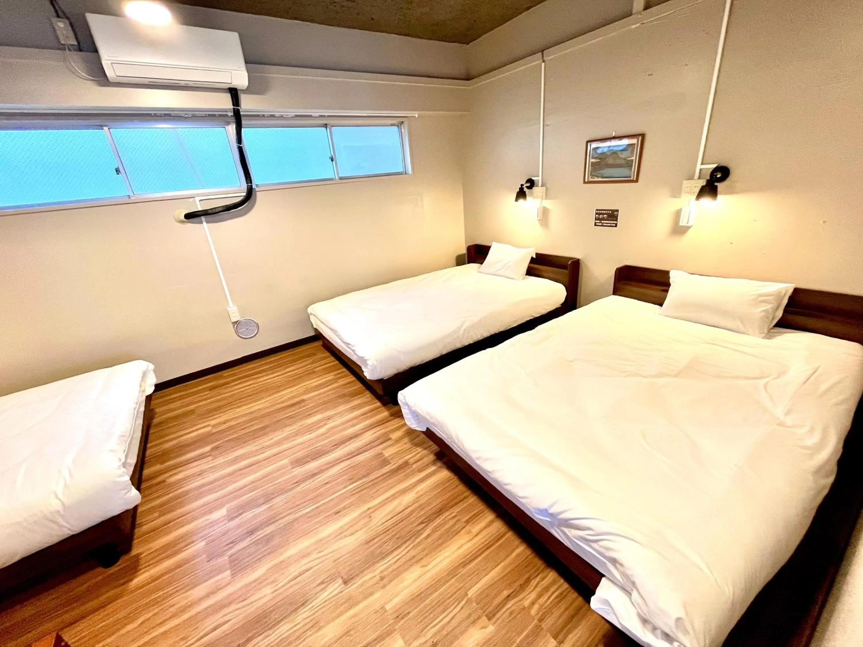 Bed in Hinode Kagurazakaekimae Hotel