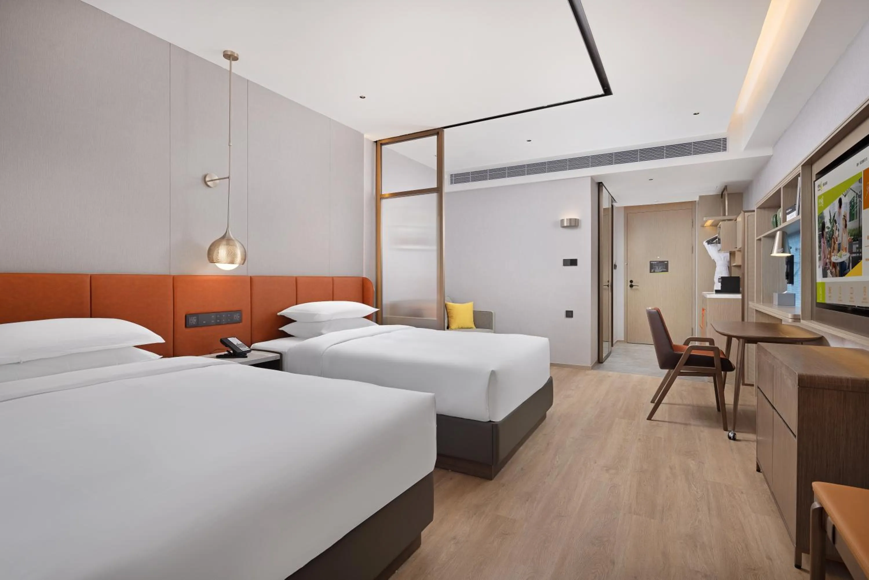 Bed in Home2 Suite by Hilton Chaozhou