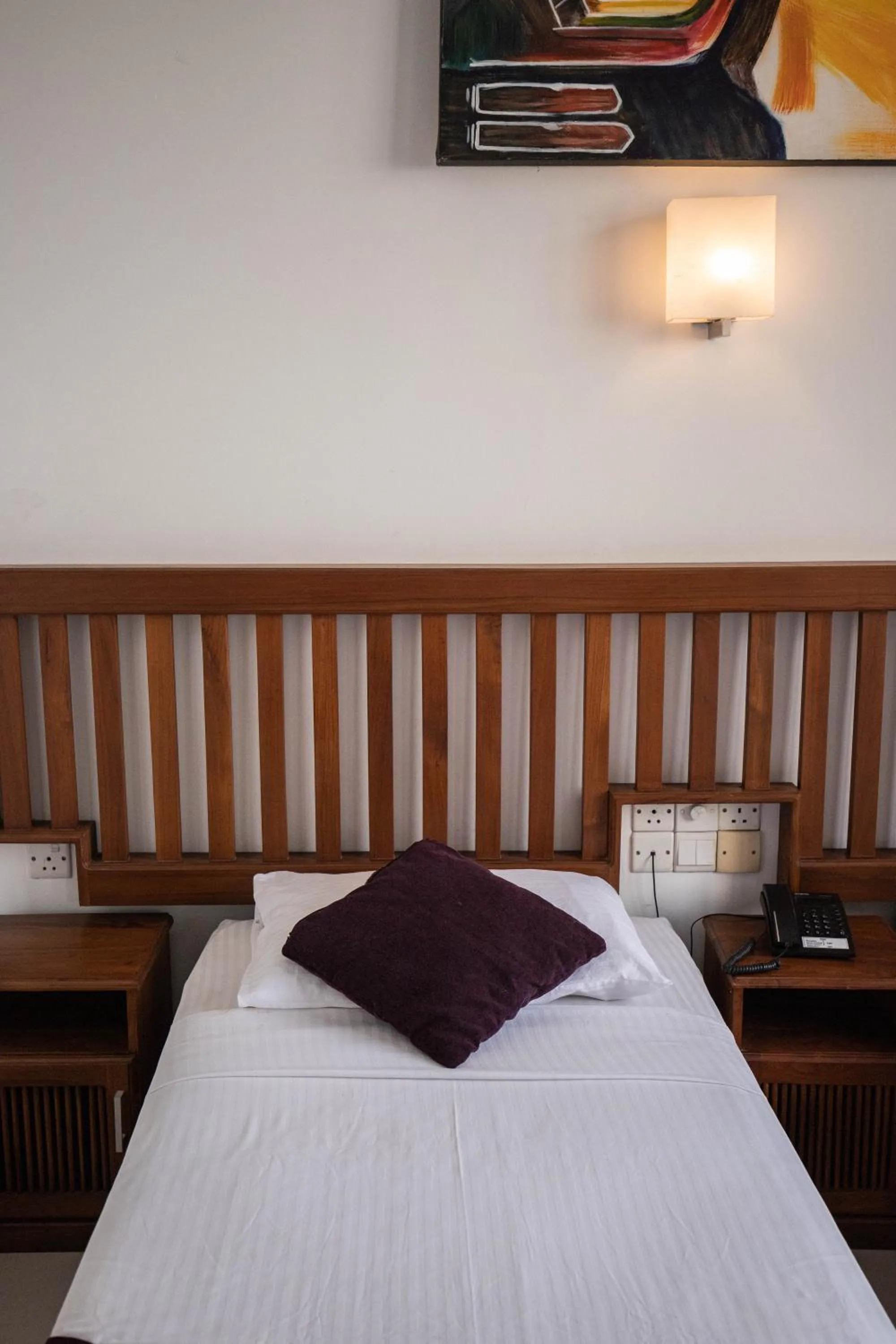 Bed in Port View City Hotel