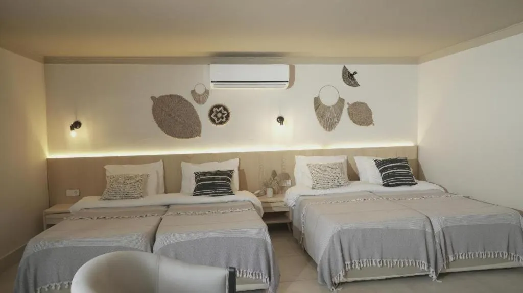 Bedroom, Bed in En Vie Beach Boutique Hotel - Adults Only