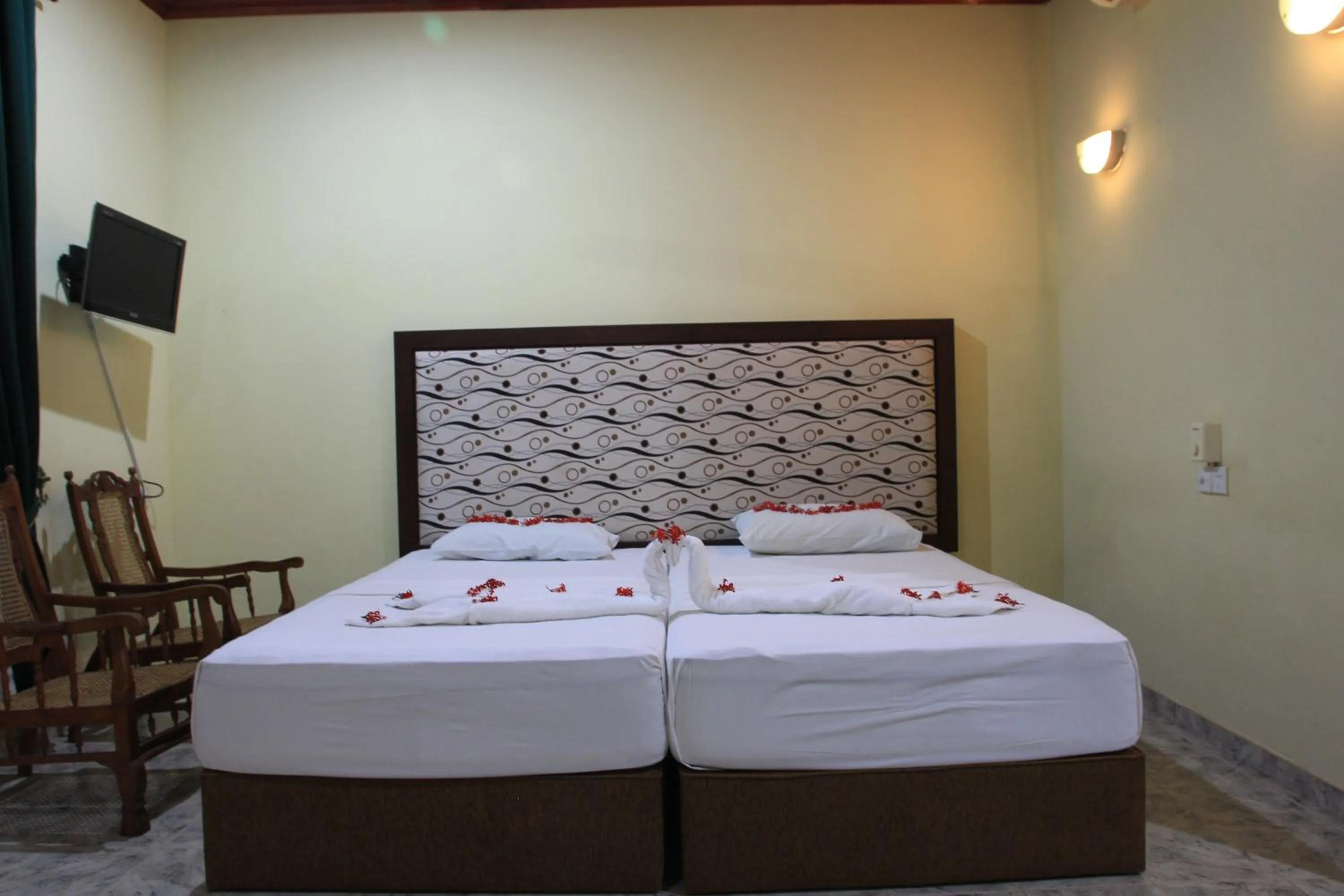 Bed in Wila Safari Hotel
