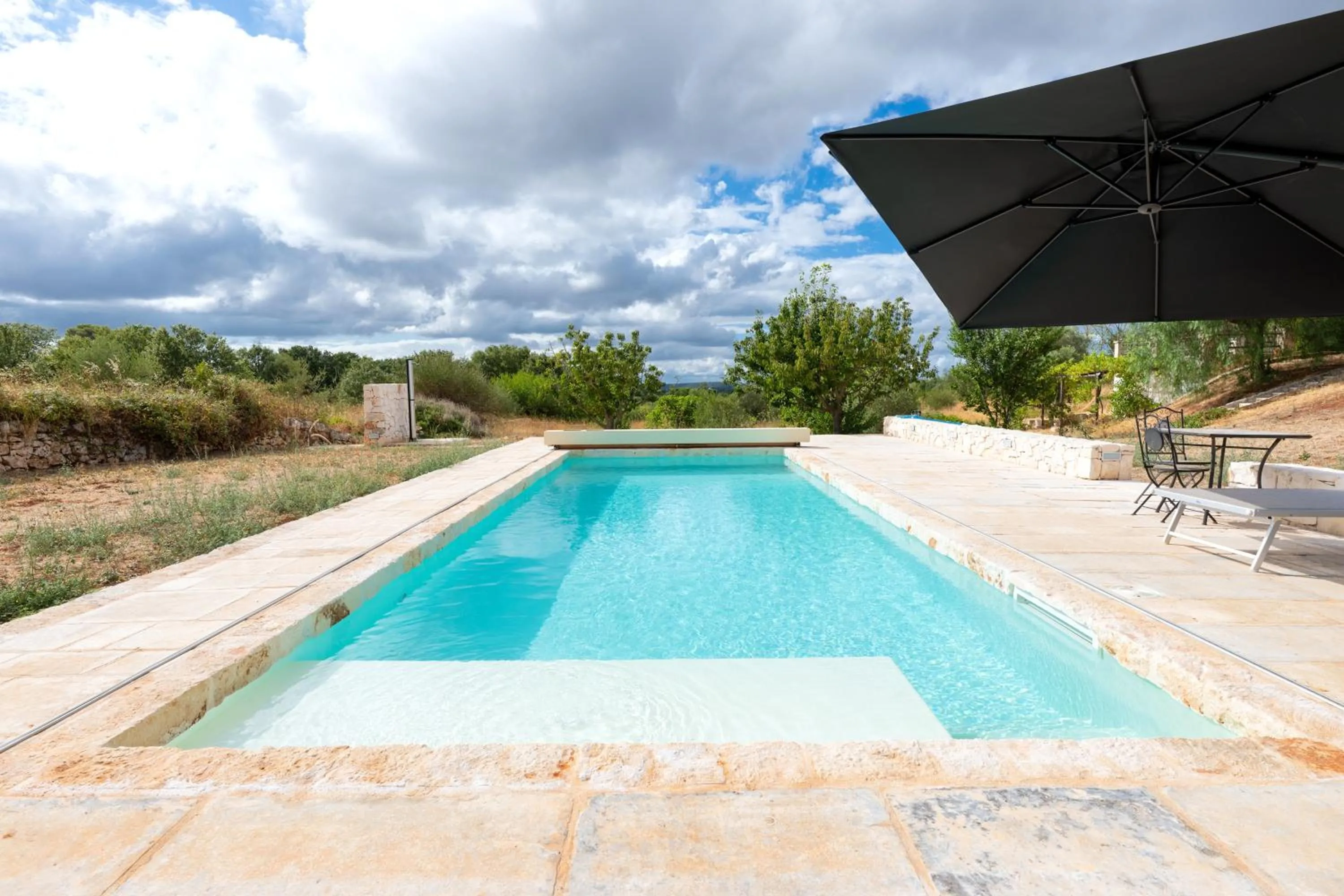 Two-Bedroom Deluxe Apartment with Garden View in Trulli Sabrina Resort