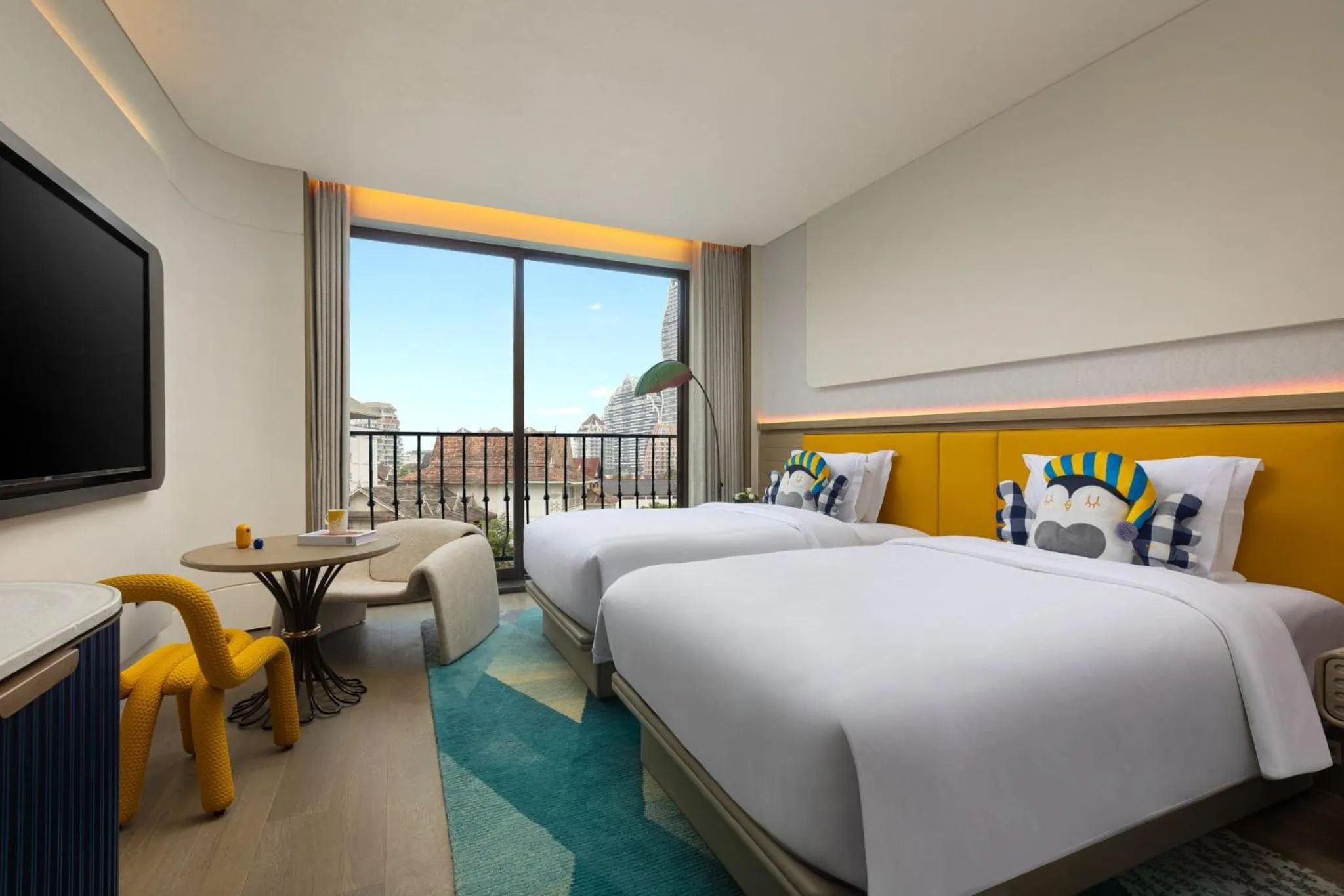 Photo of the whole room, Bed in voco Xishuangbanna Gaozhuang by IHG