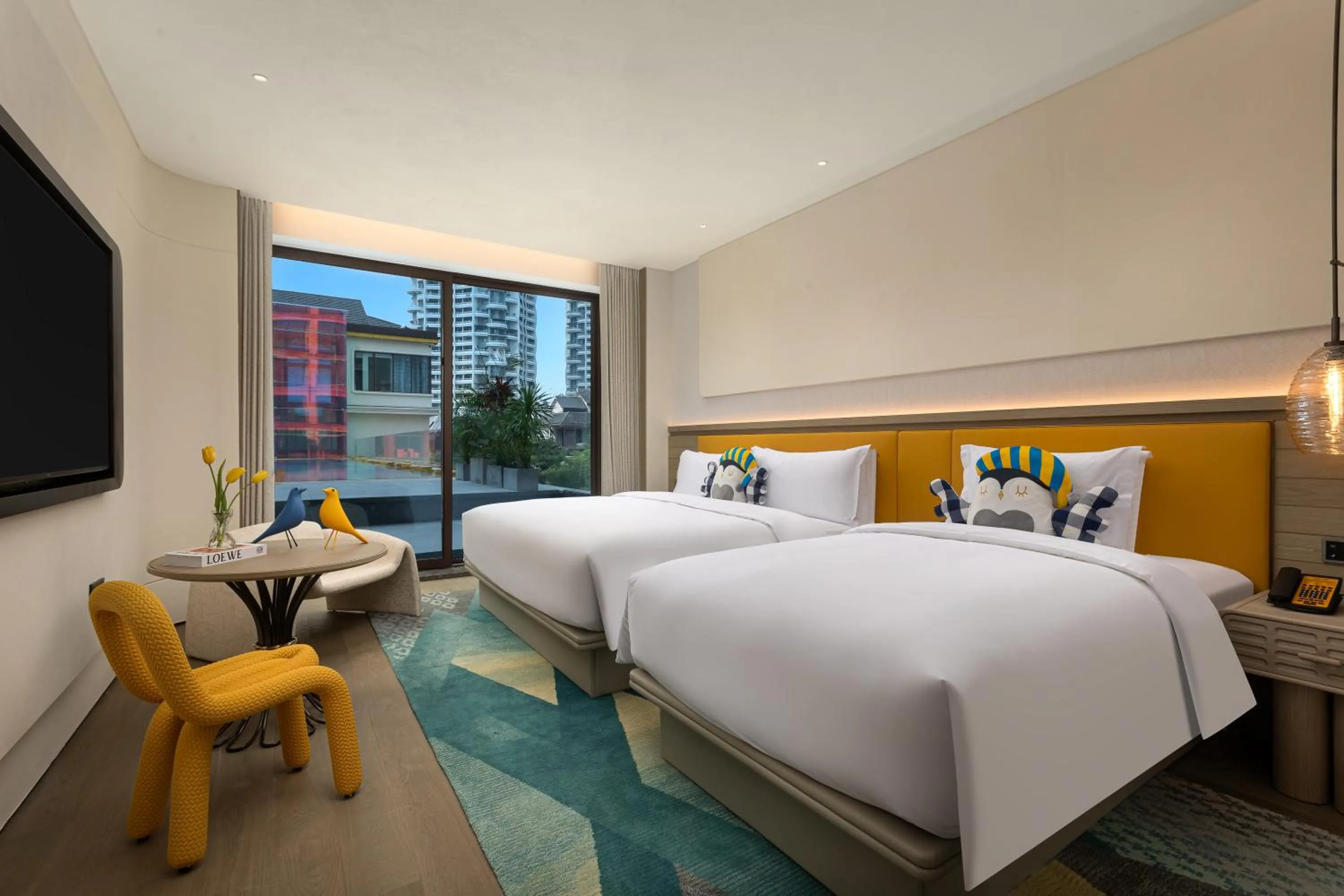 Bed in voco Xishuangbanna Gaozhuang by IHG