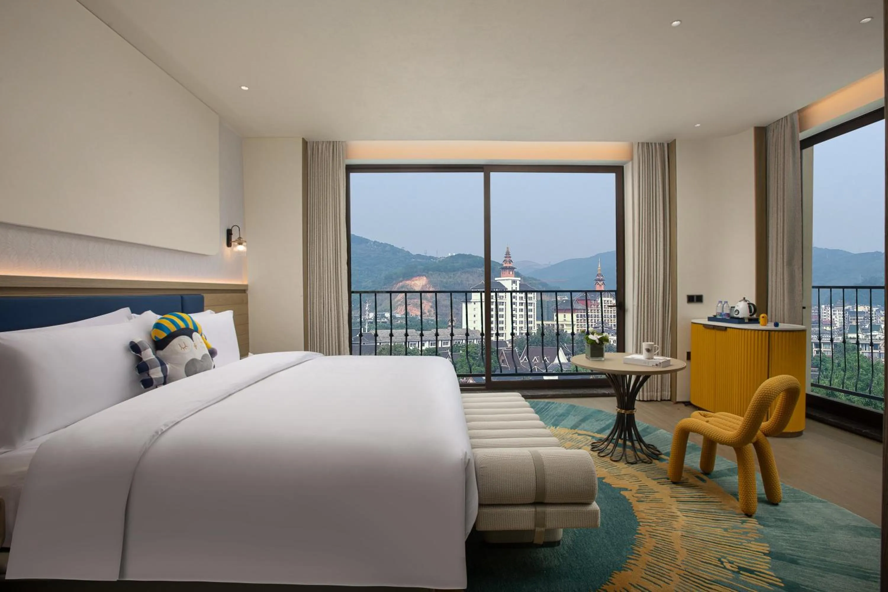 Photo of the whole room, Bed in voco Xishuangbanna Gaozhuang by IHG