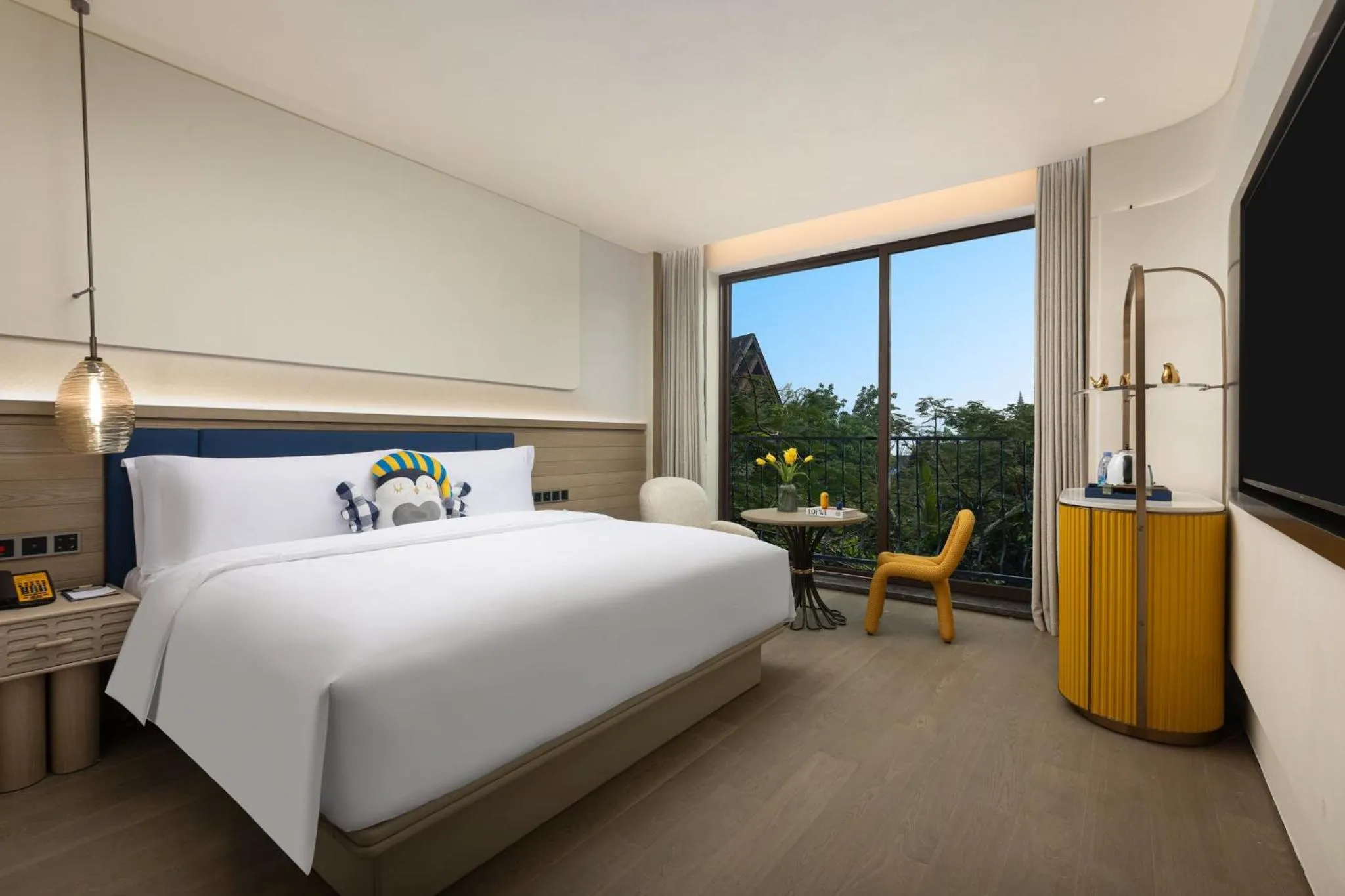 Photo of the whole room, Bed in voco Xishuangbanna Gaozhuang by IHG