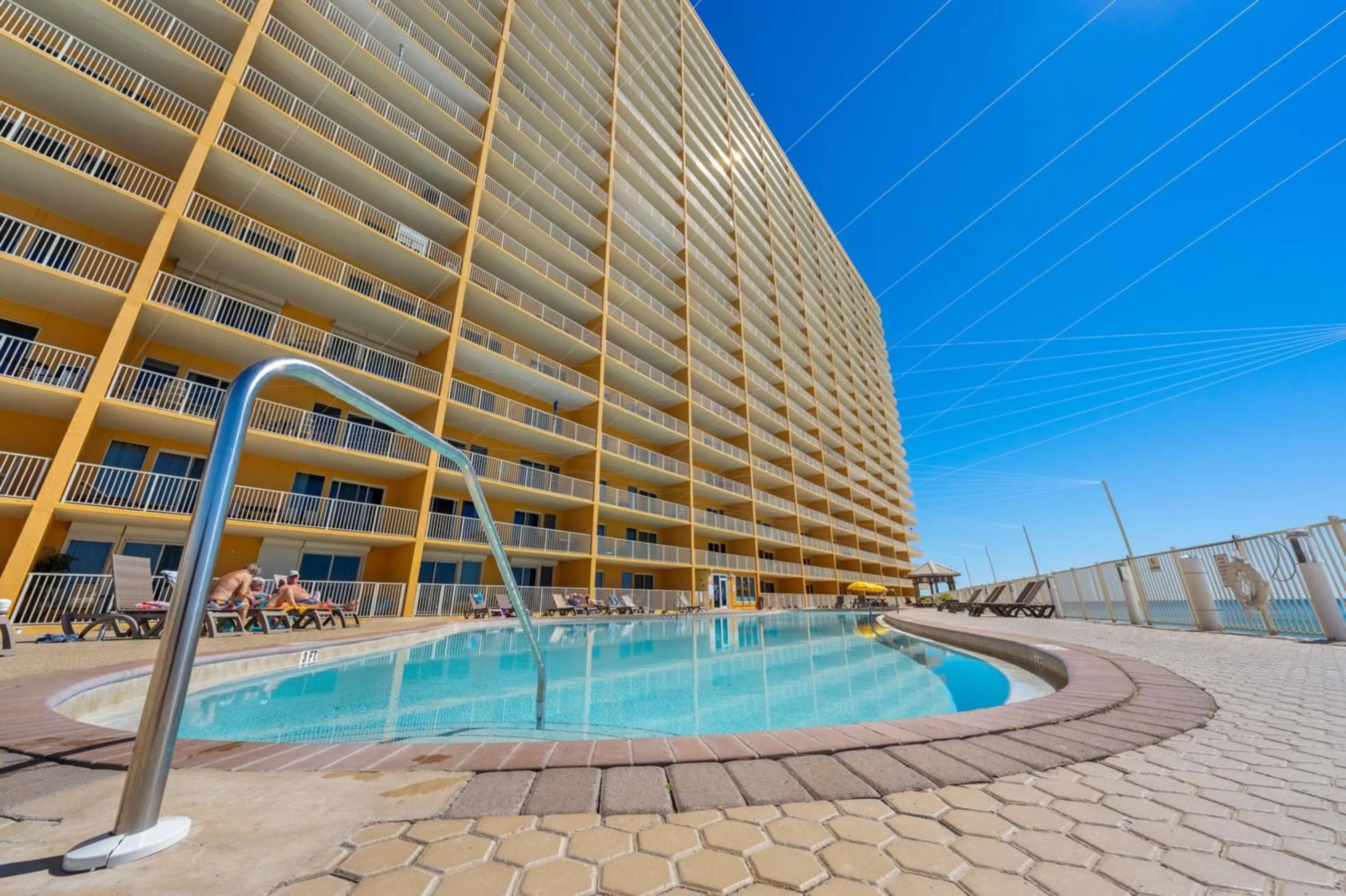 Property building in Treasure Shores–3BR Beachfront Corner Unit sleeps 8 with Stunning Gulf Views!