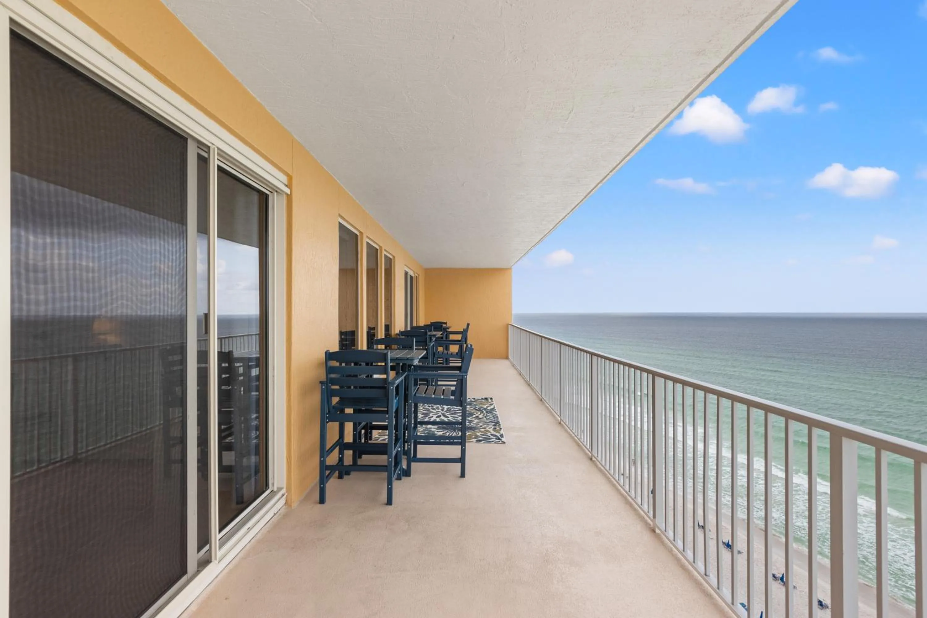 Balcony/Terrace in Treasure Shores–3BR Beachfront Corner Unit sleeps 8 with Stunning Gulf Views!
