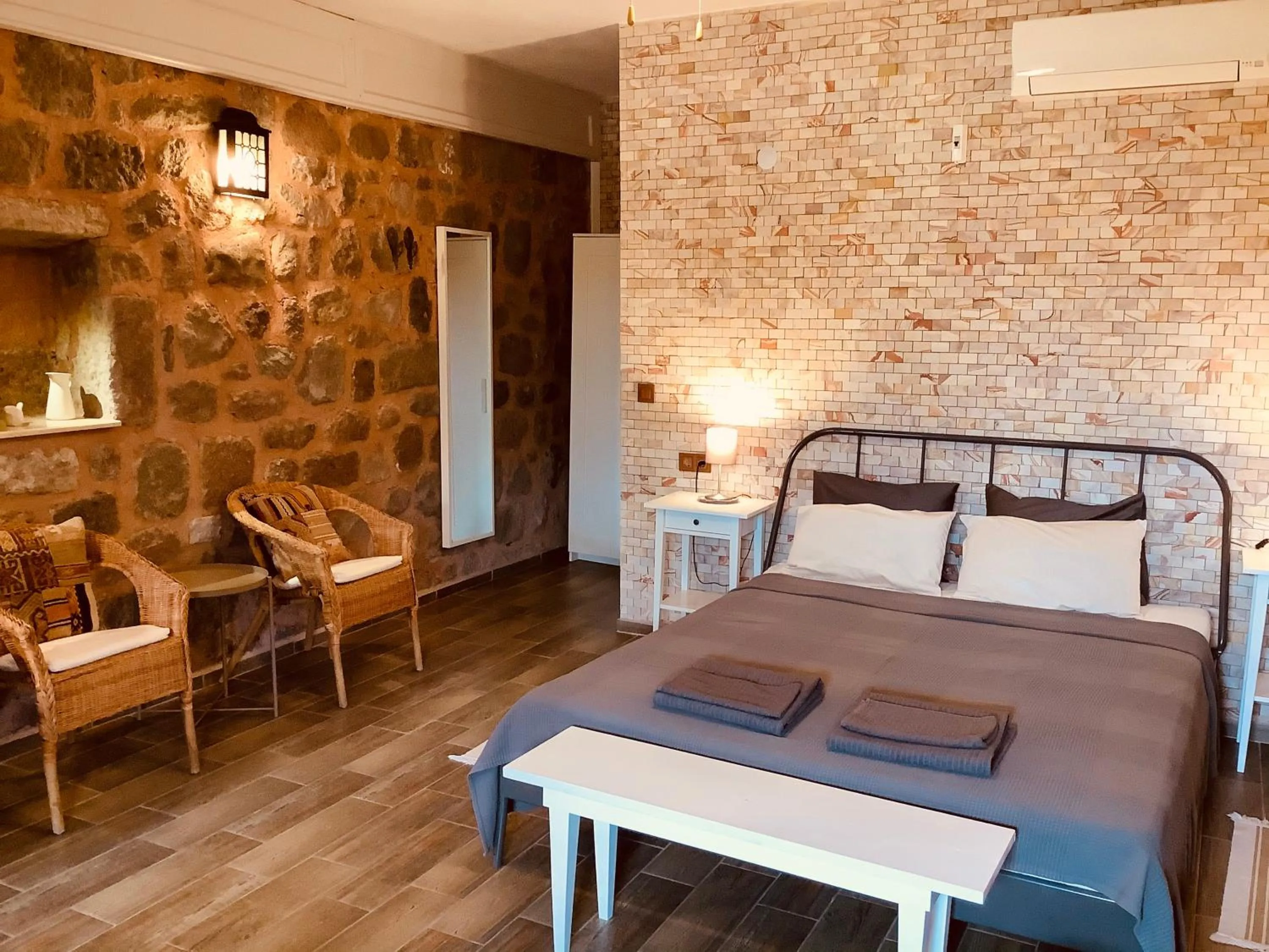 Bed in Attalos Suites Hotel