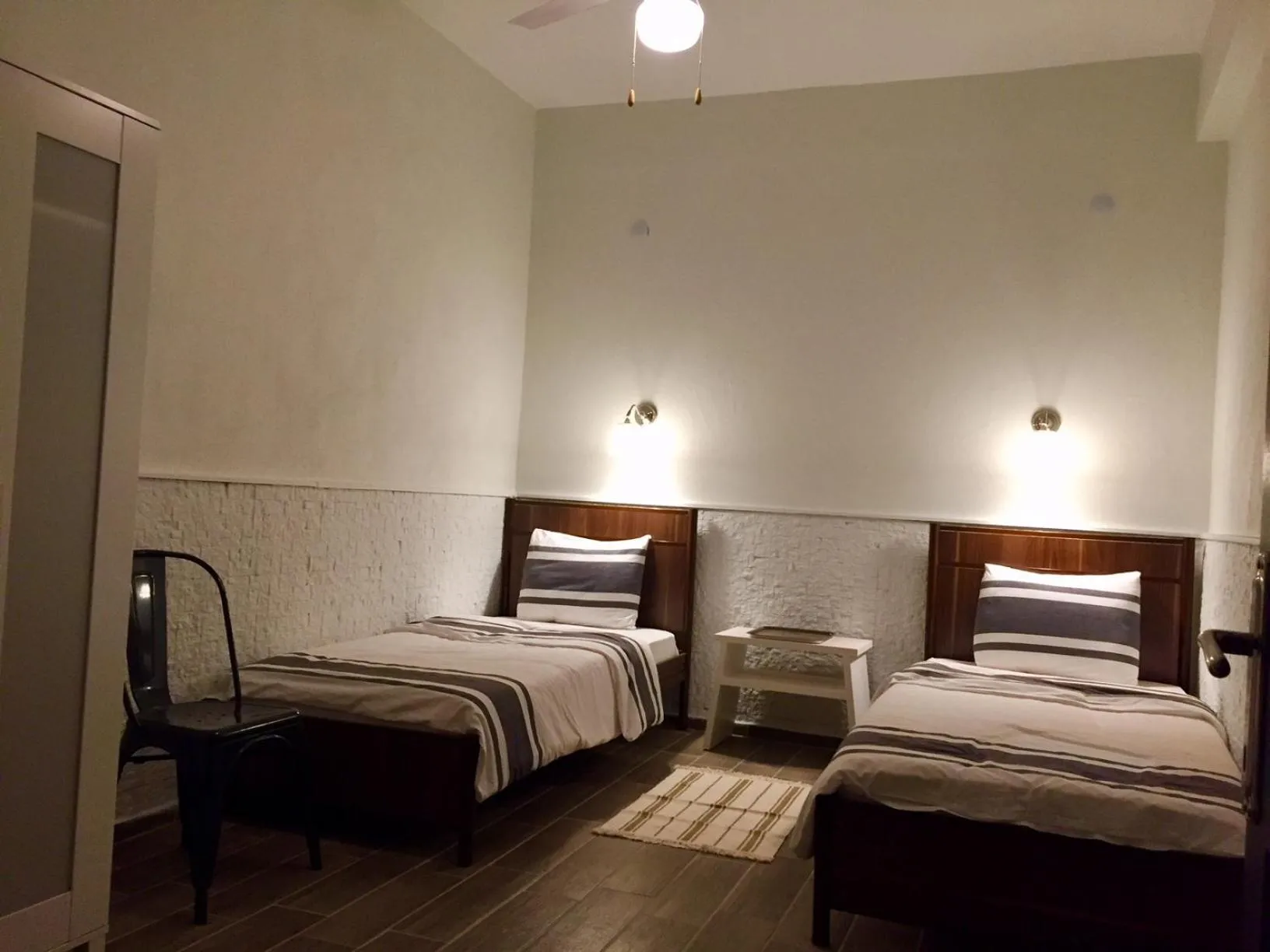 Bed in Attalos Suites Hotel