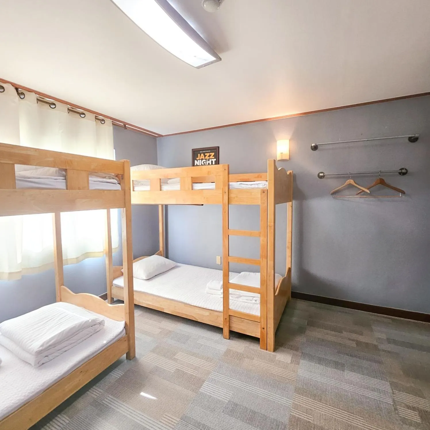 Bedroom, Bed in Jeju EQ Stay Hotel