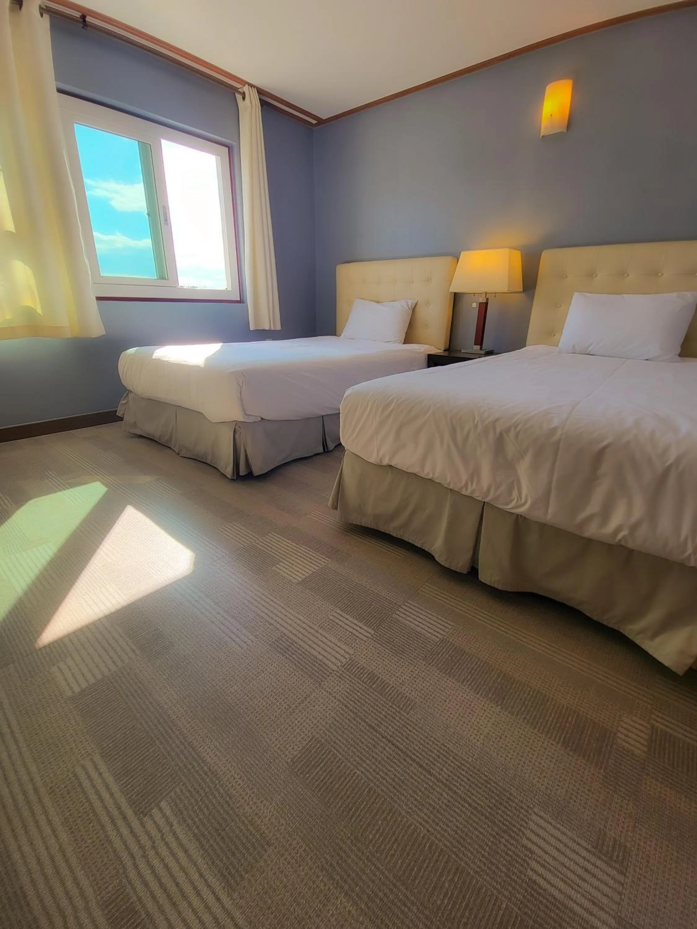 Bedroom, Bed in Jeju EQ Stay Hotel