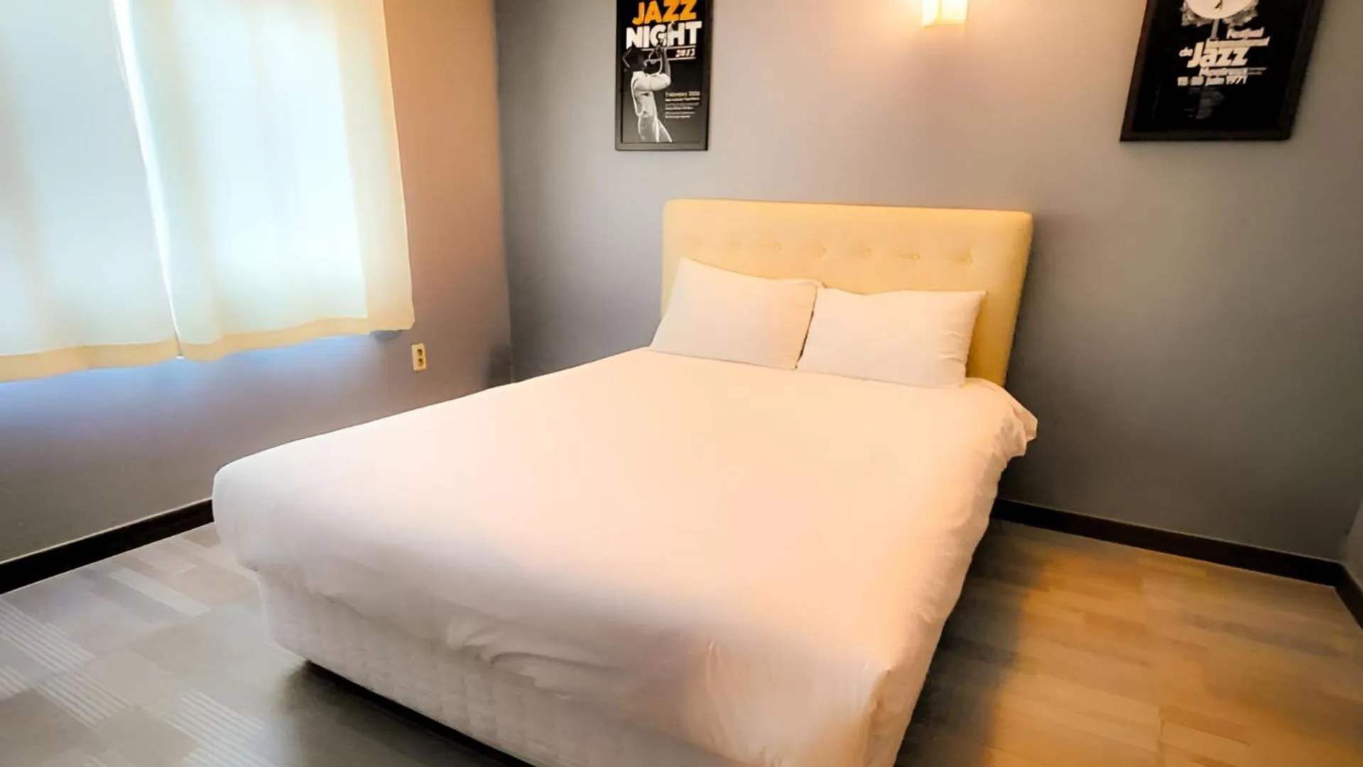 Bedroom, Bed in Jeju EQ Stay Hotel