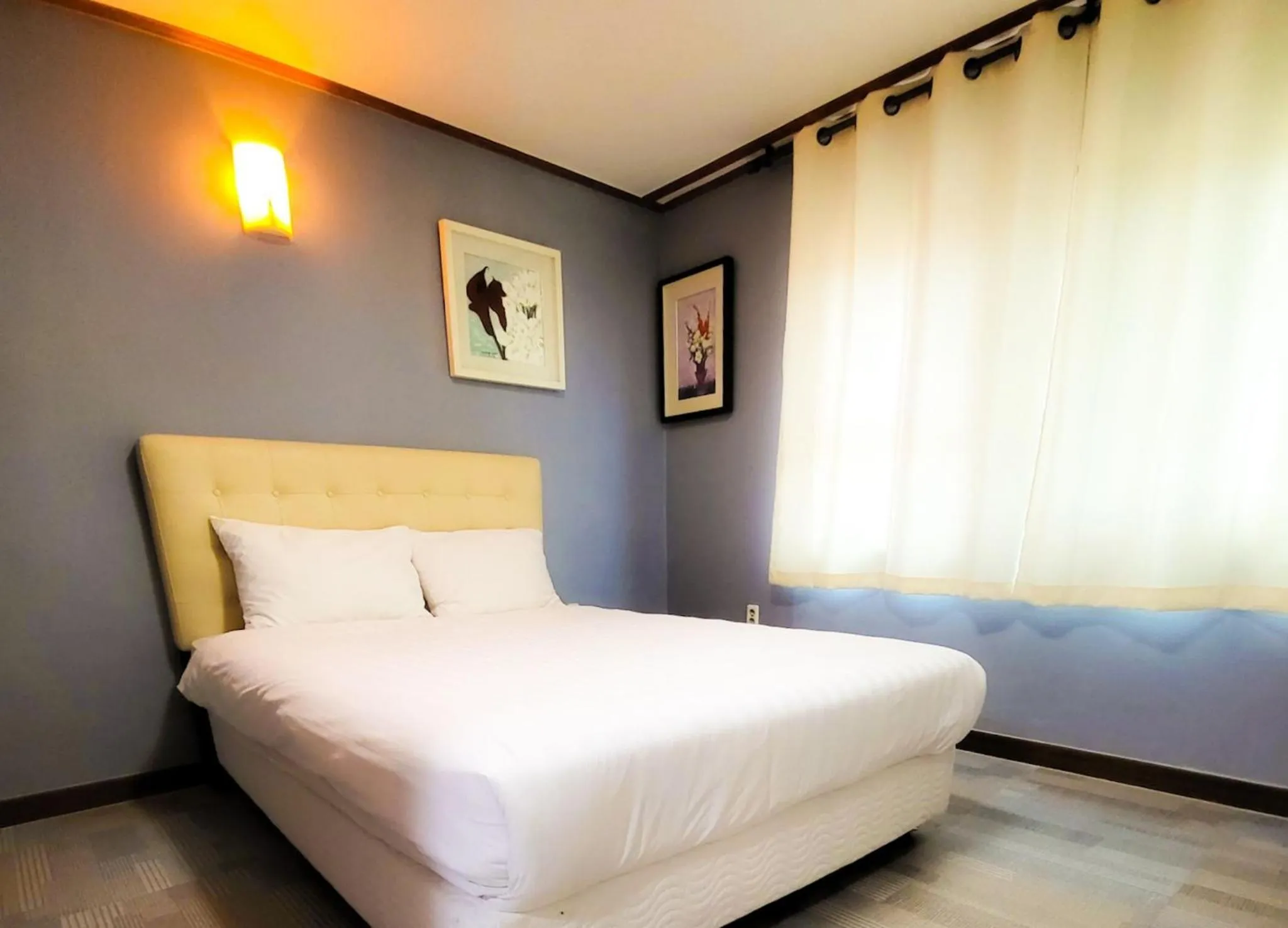 Bedroom, Bed in Jeju EQ Stay Hotel