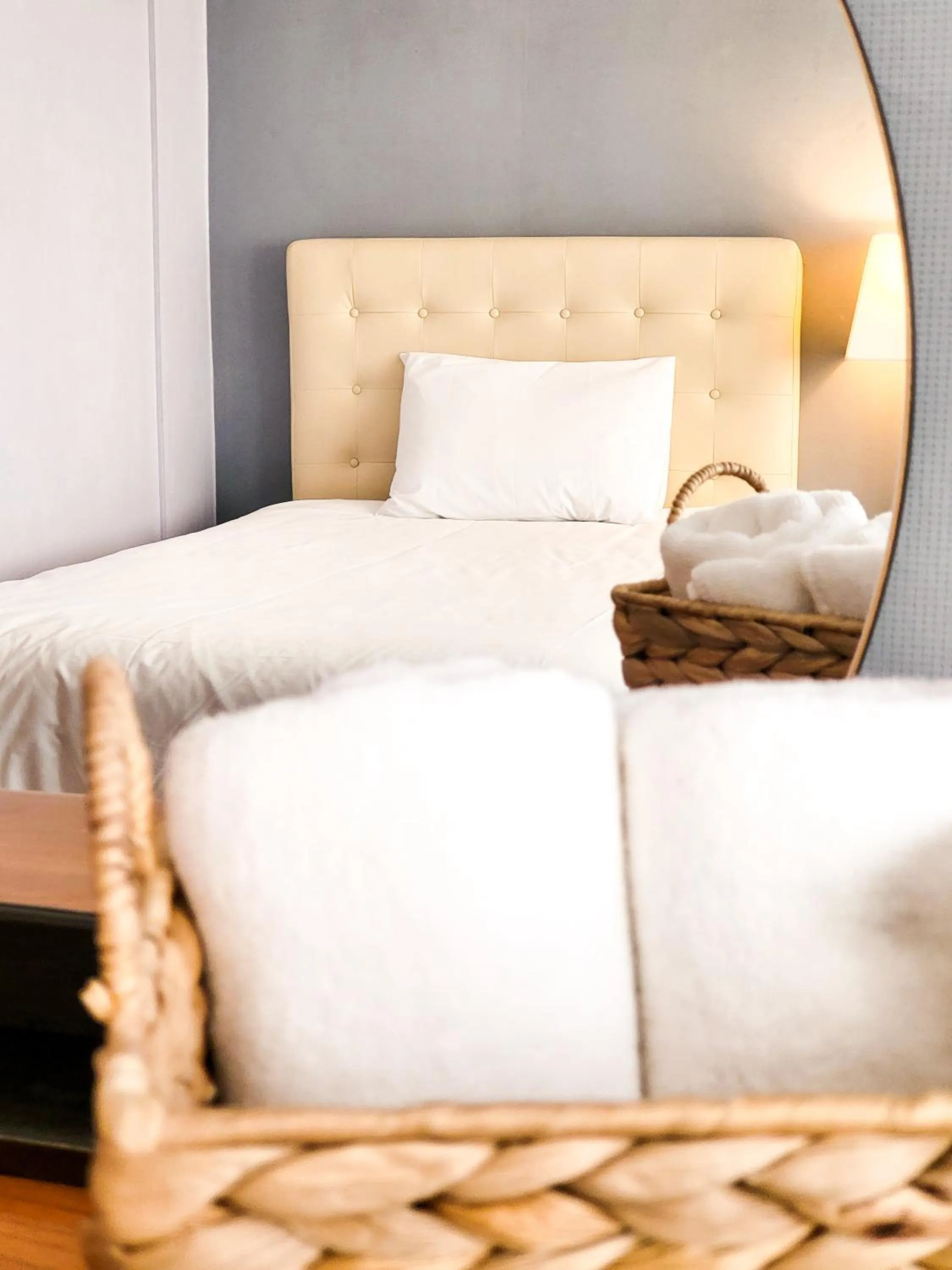 Bed in Jeju EQ Stay Hotel