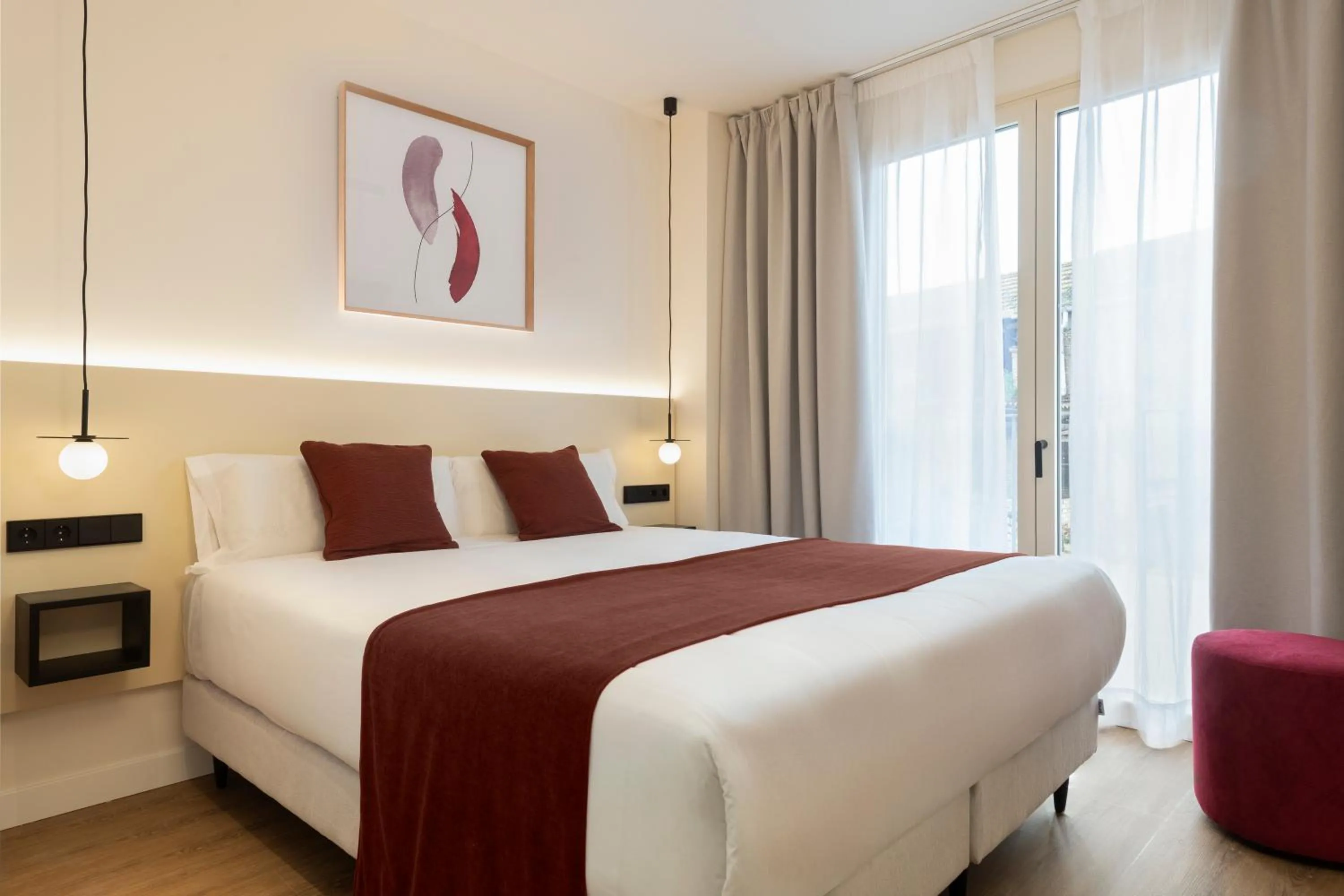 Bed in Magno Apartments Clavellinas