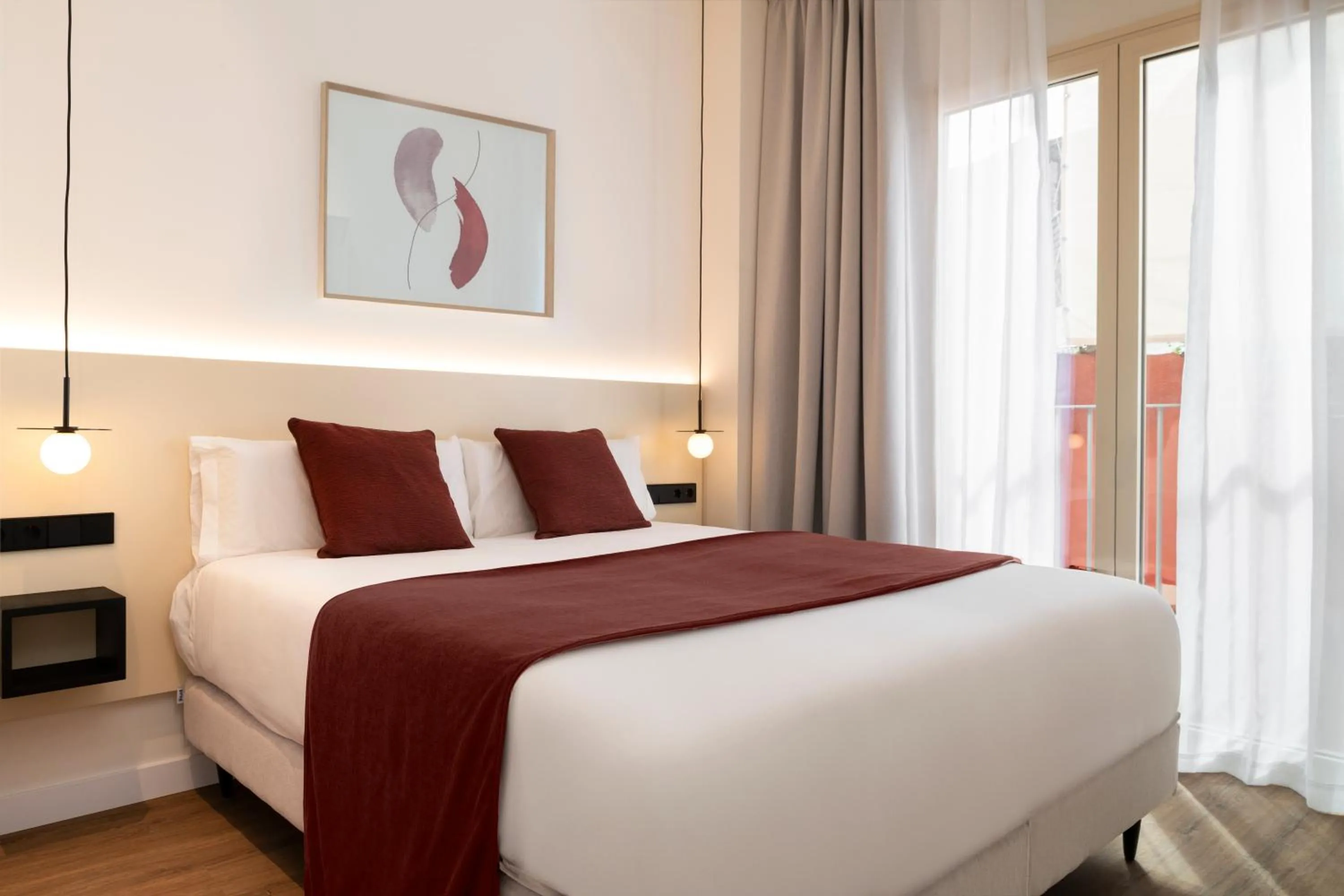 Bed in Magno Apartments Clavellinas