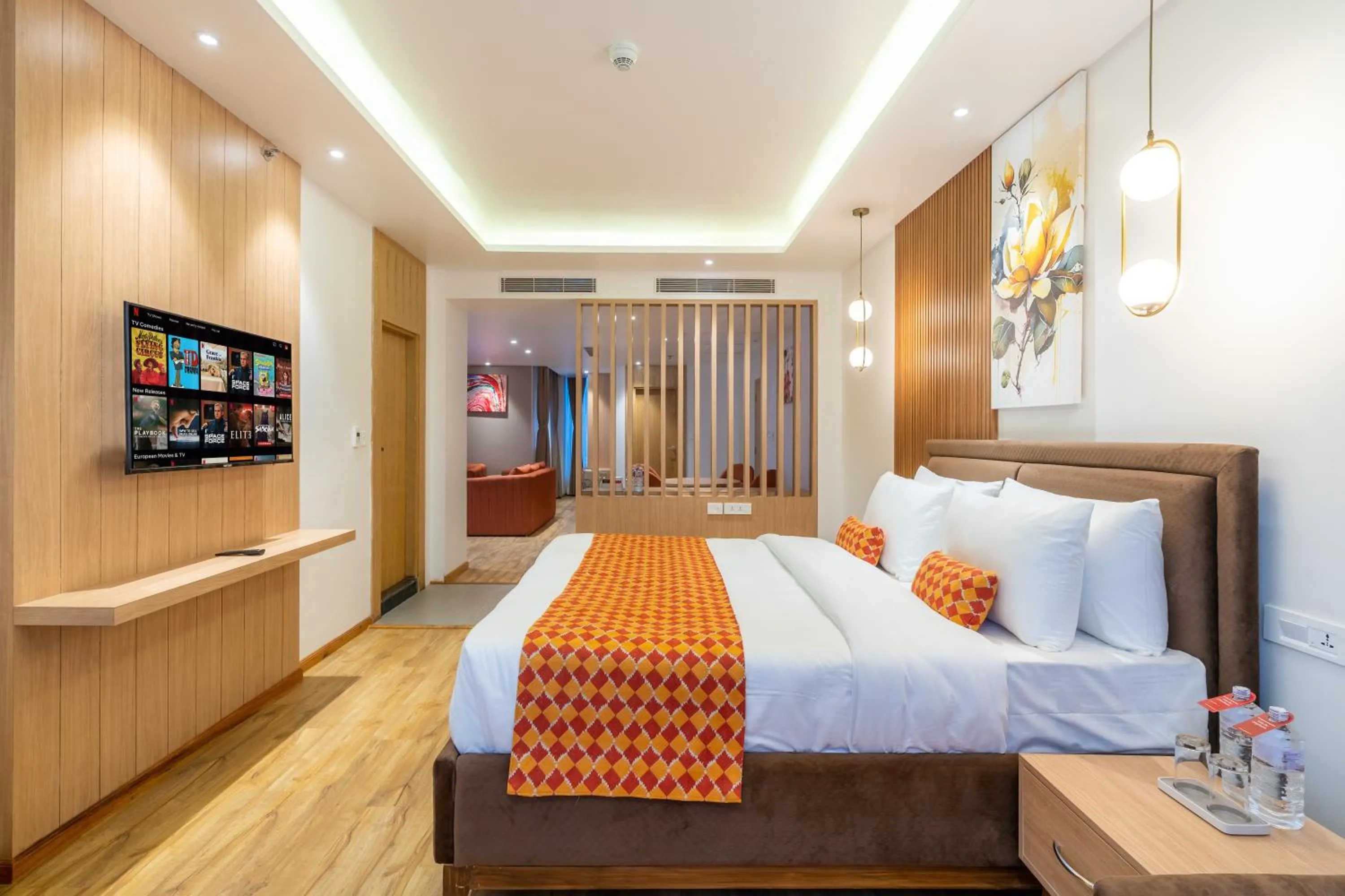 Communal lounge/ TV room, Bed in Hotel Anuttara