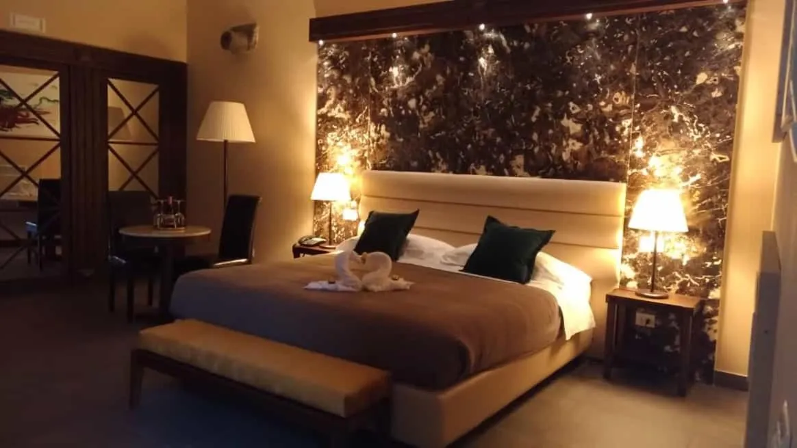 Bed in Firriato Hospitality Cavanera Etnea Resort & Wine Experience