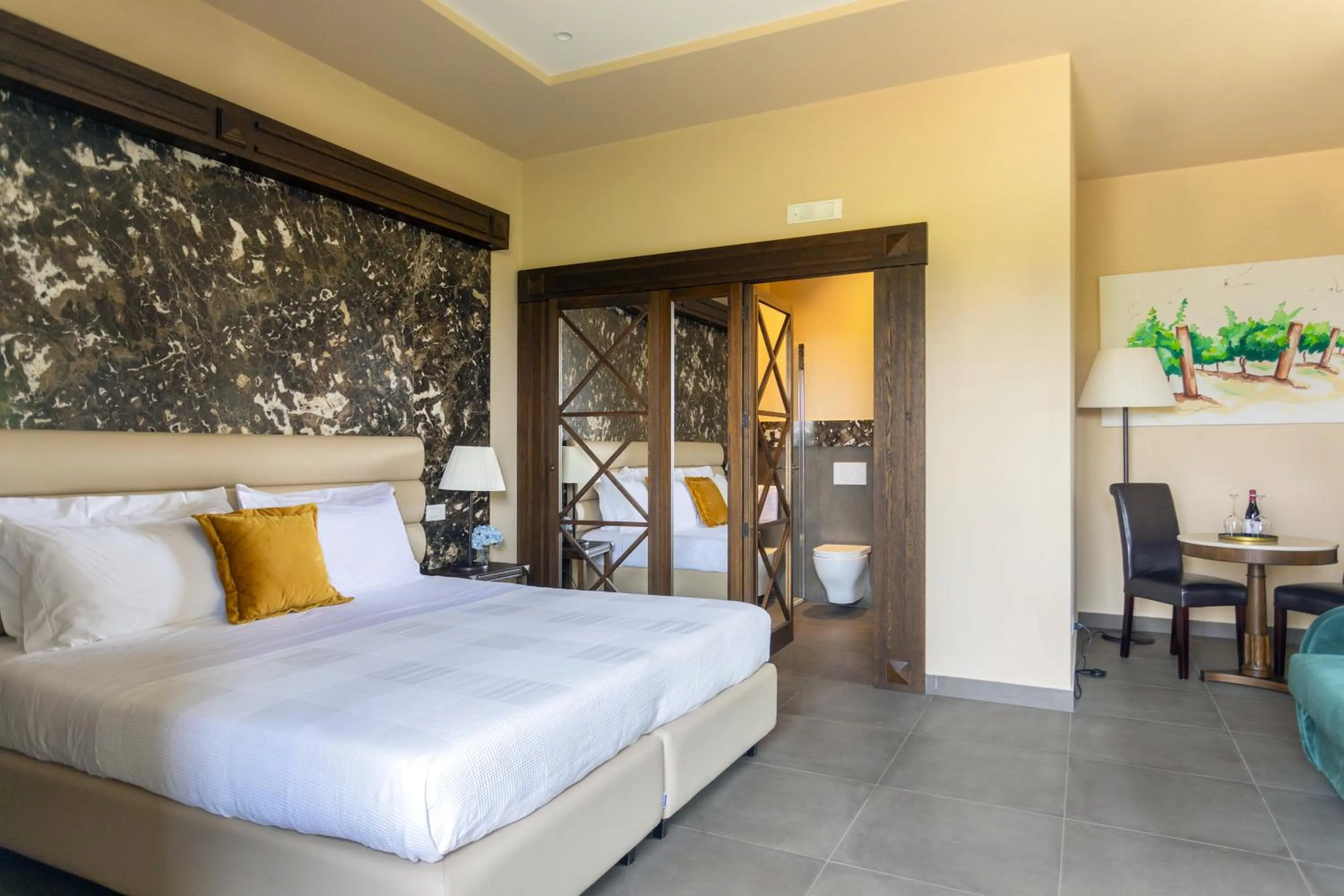 Bed in Firriato Hospitality Cavanera Etnea Resort & Wine Experience