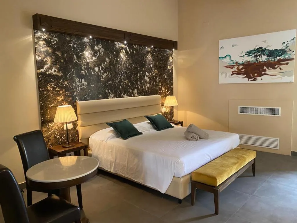 Bed in Firriato Hospitality Cavanera Etnea Resort & Wine Experience