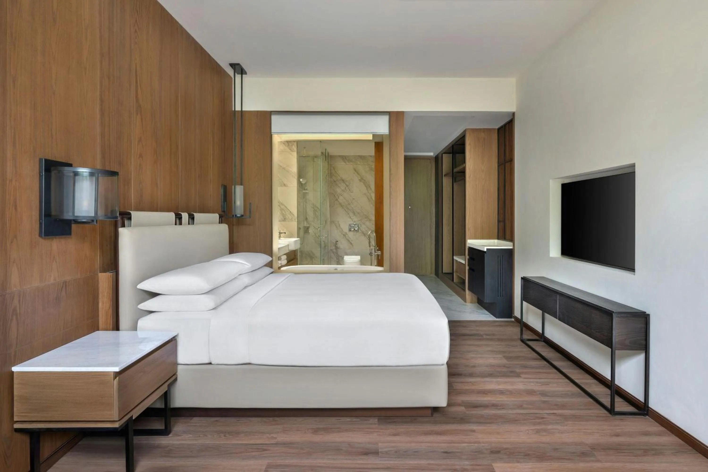 Photo of the whole room, Bed in Jim Corbett Marriott Resort & Spa