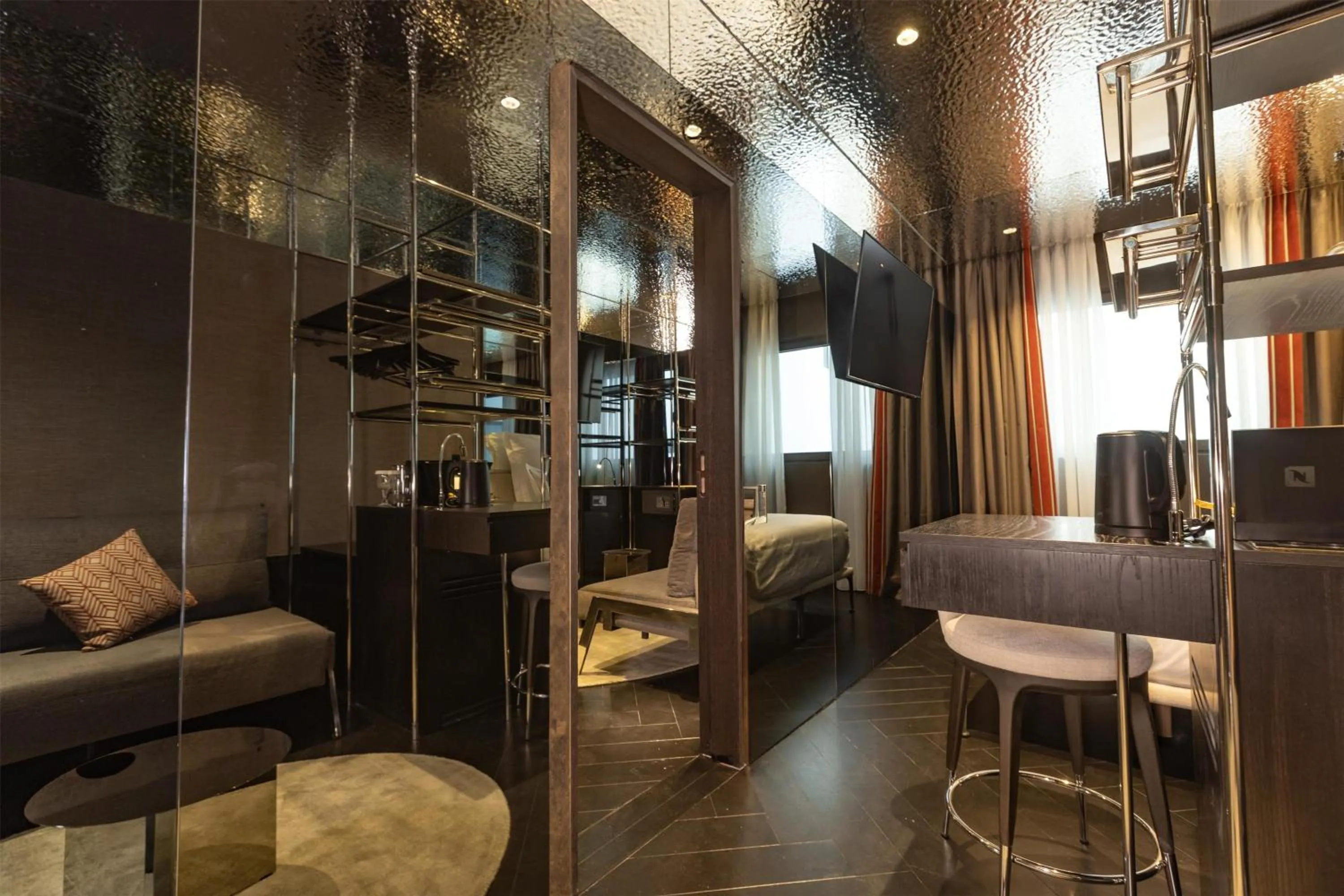 Living room in Adia Aluma Athens, Curio Collection By Hilton