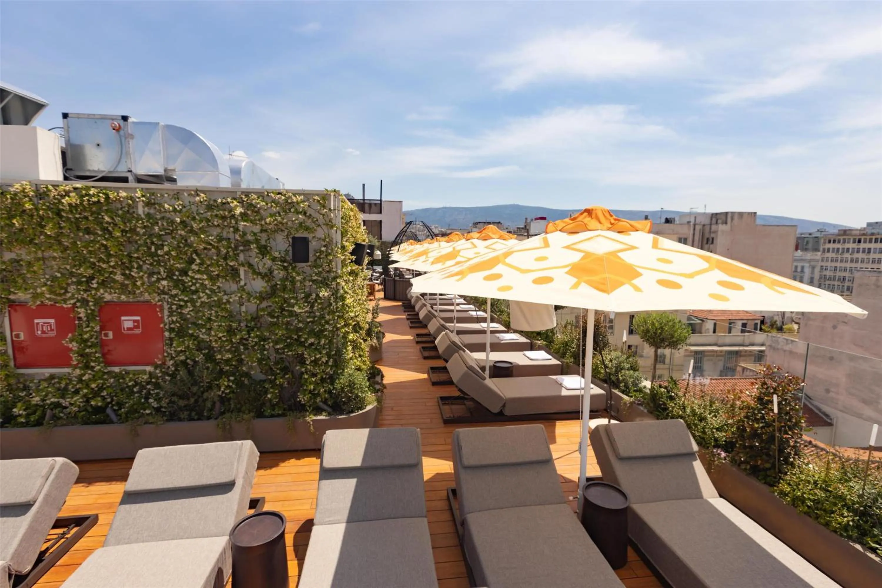 Patio in Adia Aluma Athens, Curio Collection By Hilton