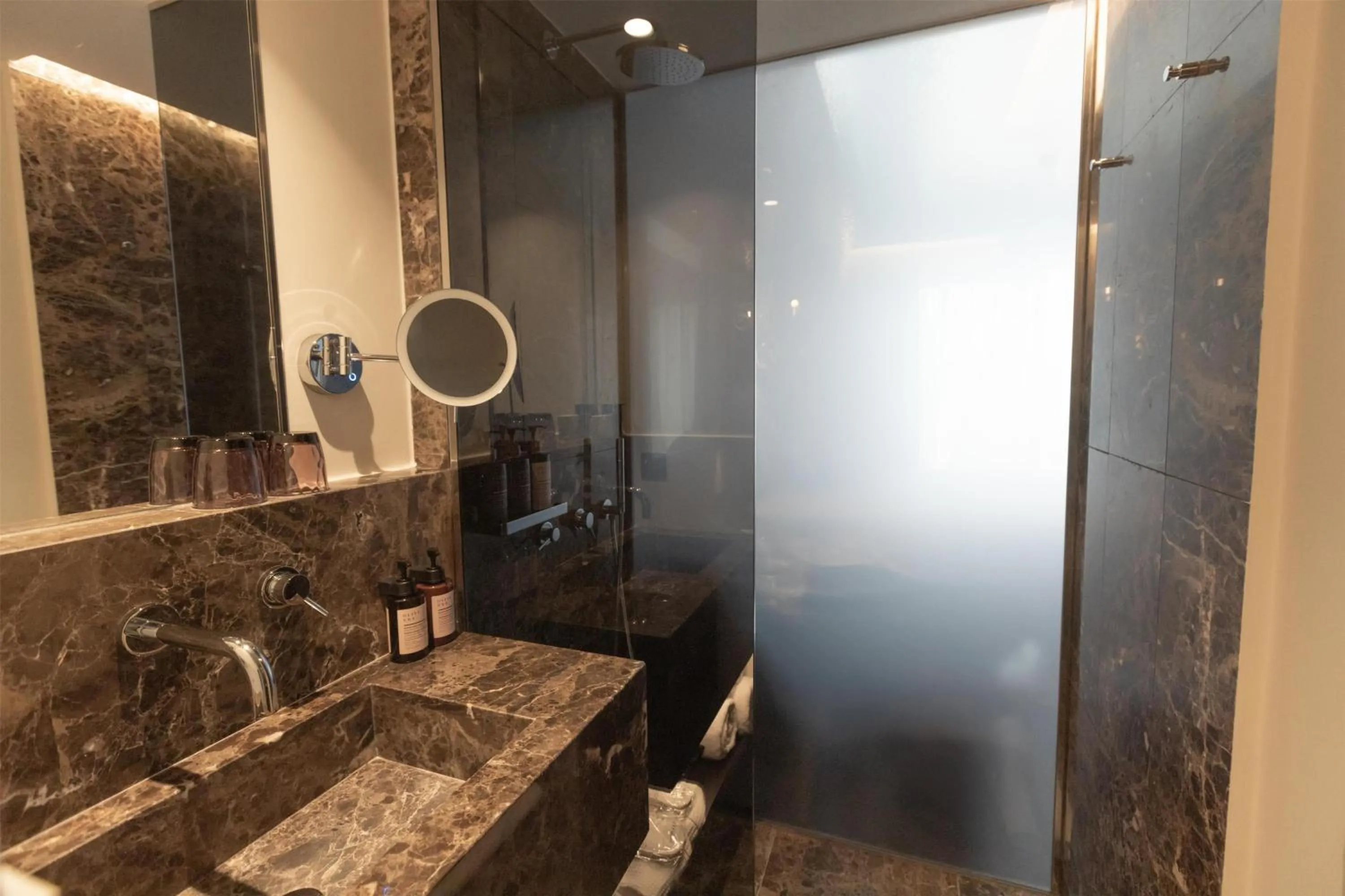 Bathroom in Adia Aluma Athens, Curio Collection By Hilton