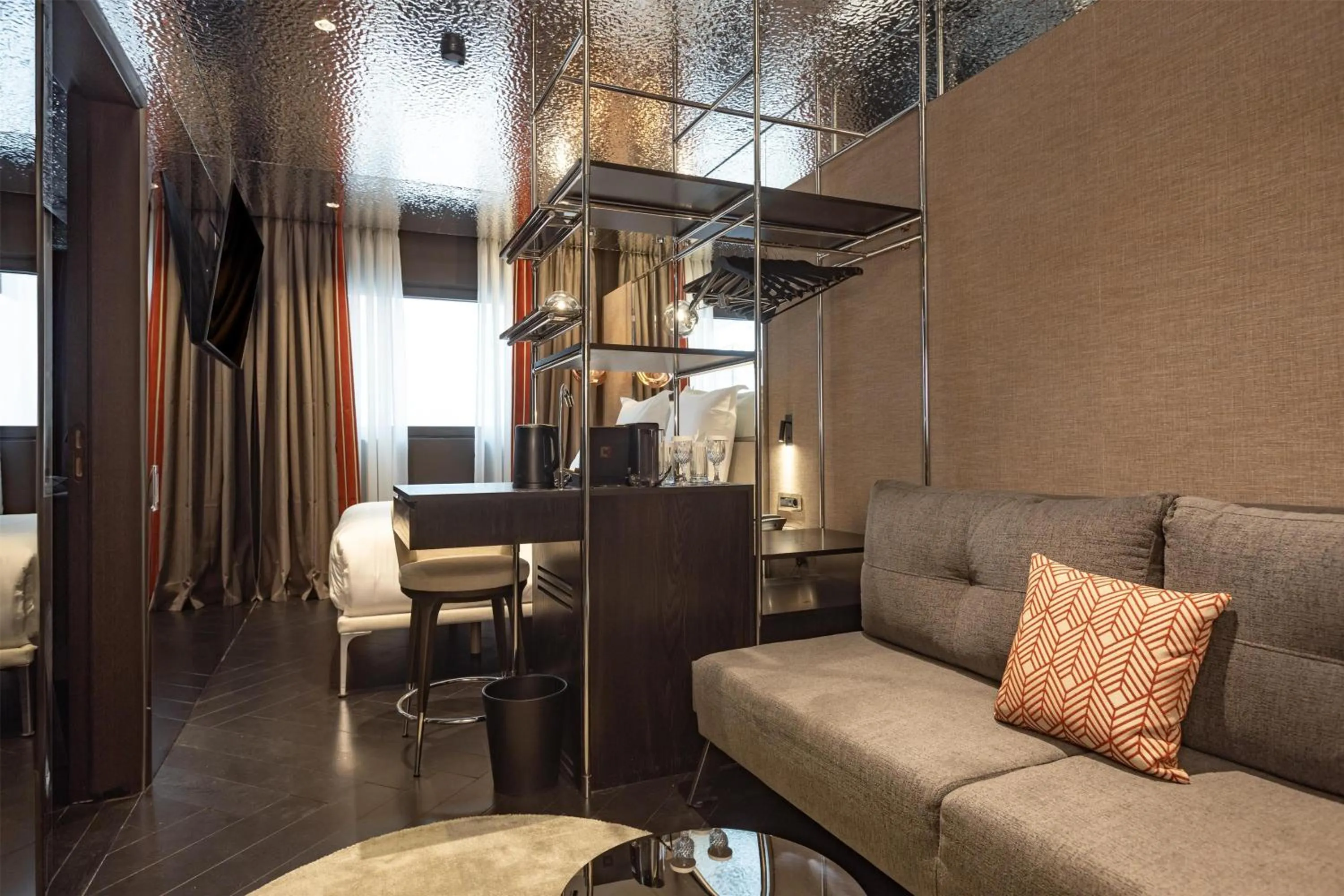 Living room in Adia Aluma Athens, Curio Collection By Hilton