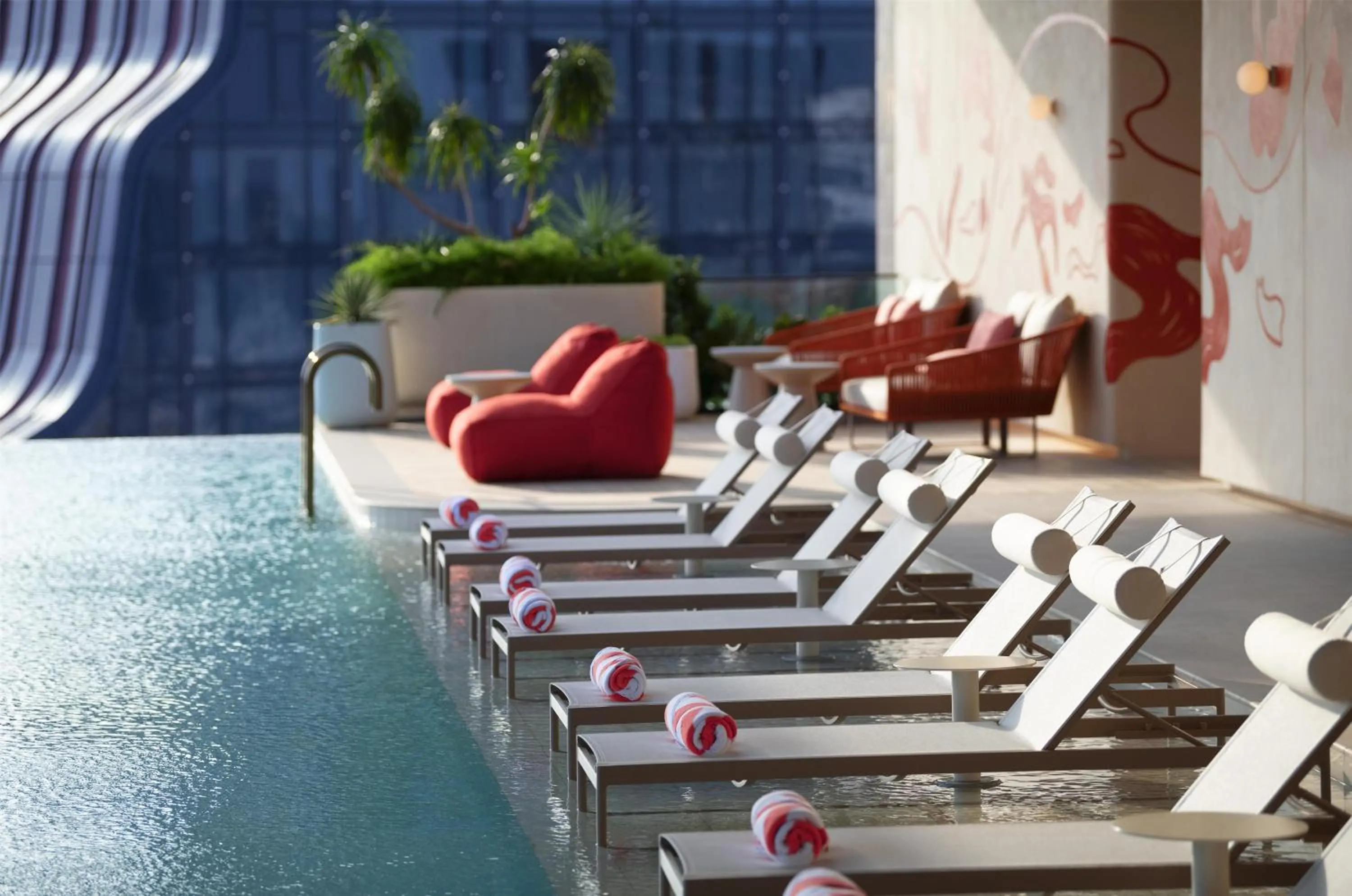 Pool view in Kromo Bangkok, Curio Collection By Hilton