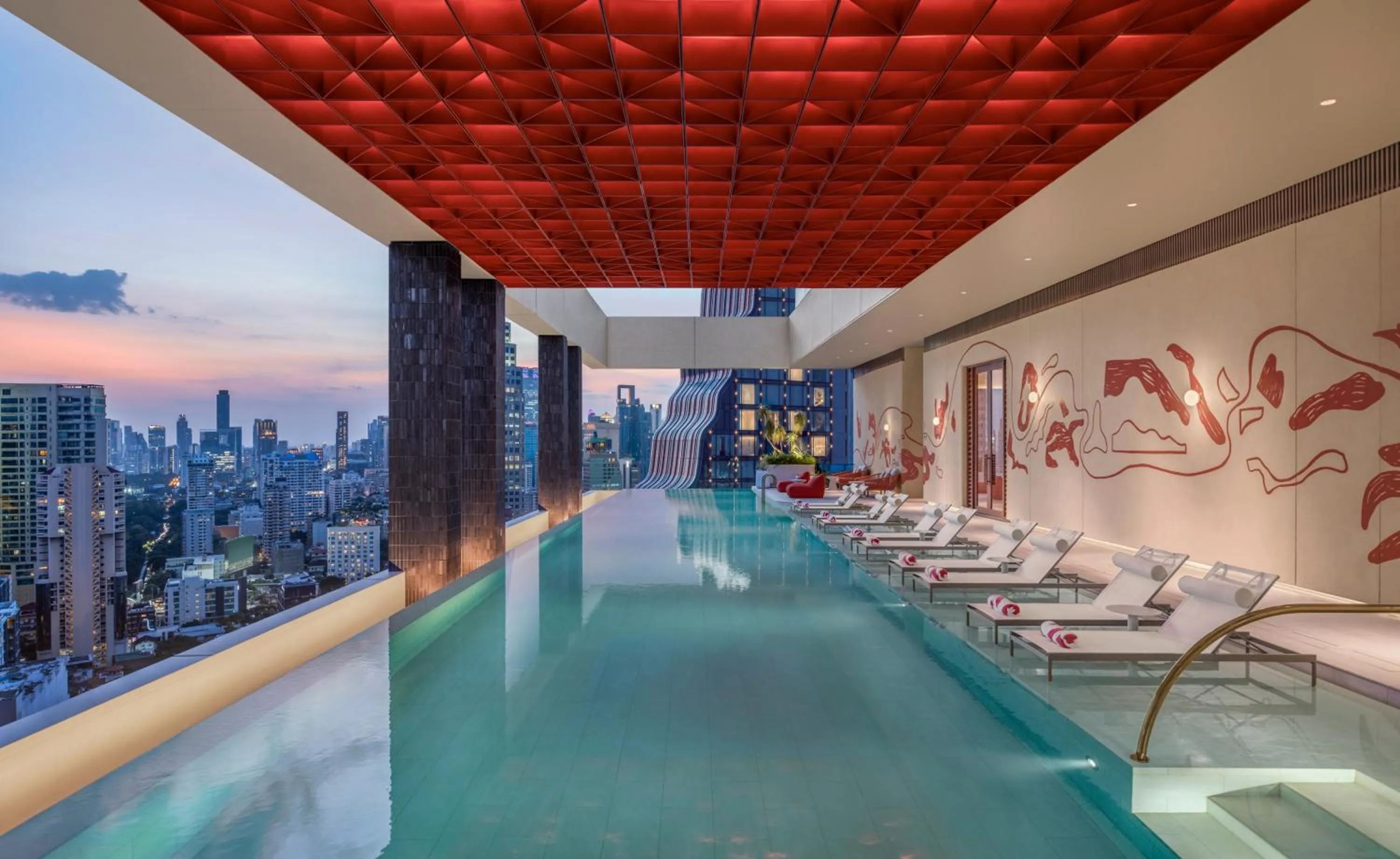 Pool view in Kromo Bangkok, Curio Collection By Hilton