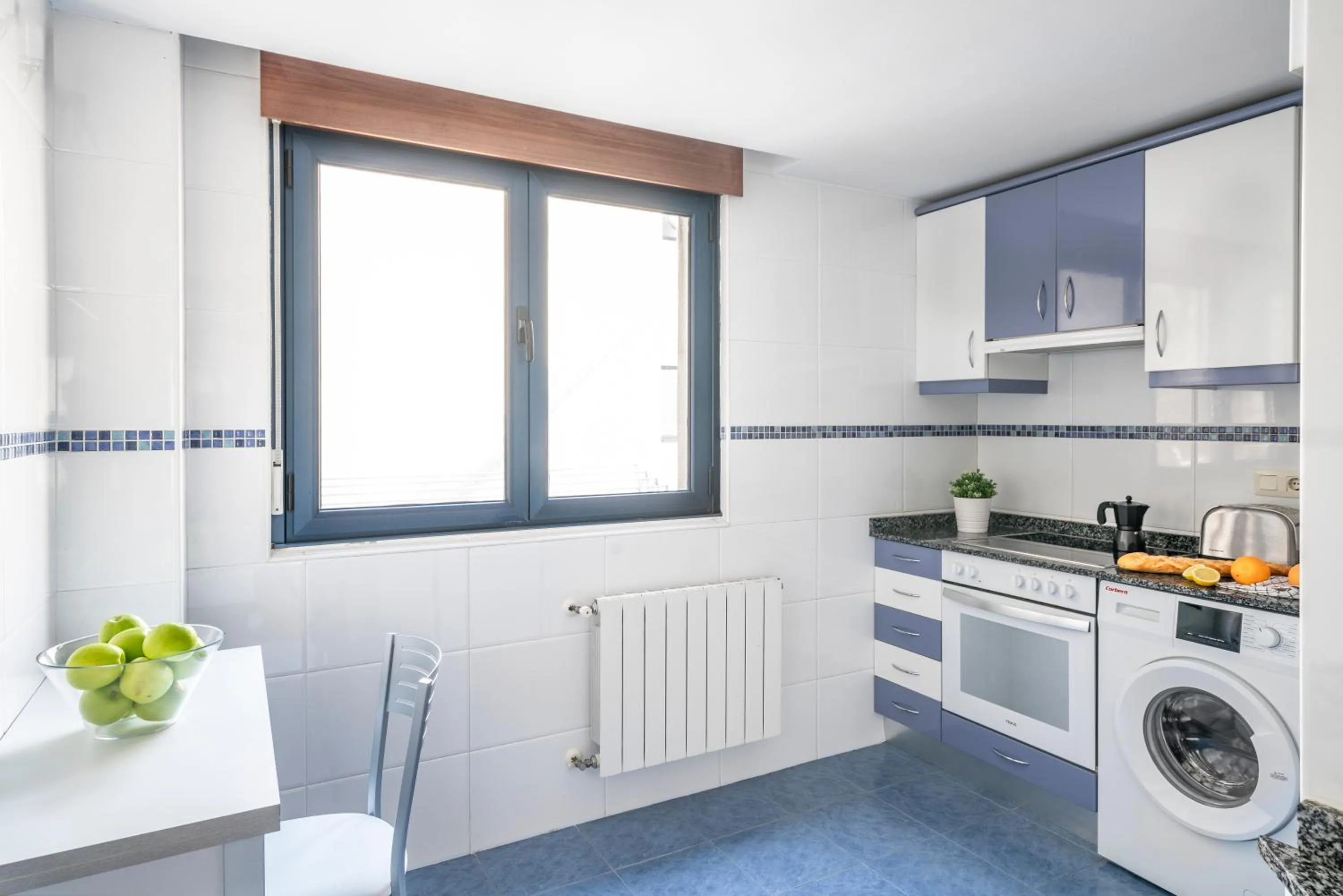 Kitchen or kitchenette in Apartamentos Alday