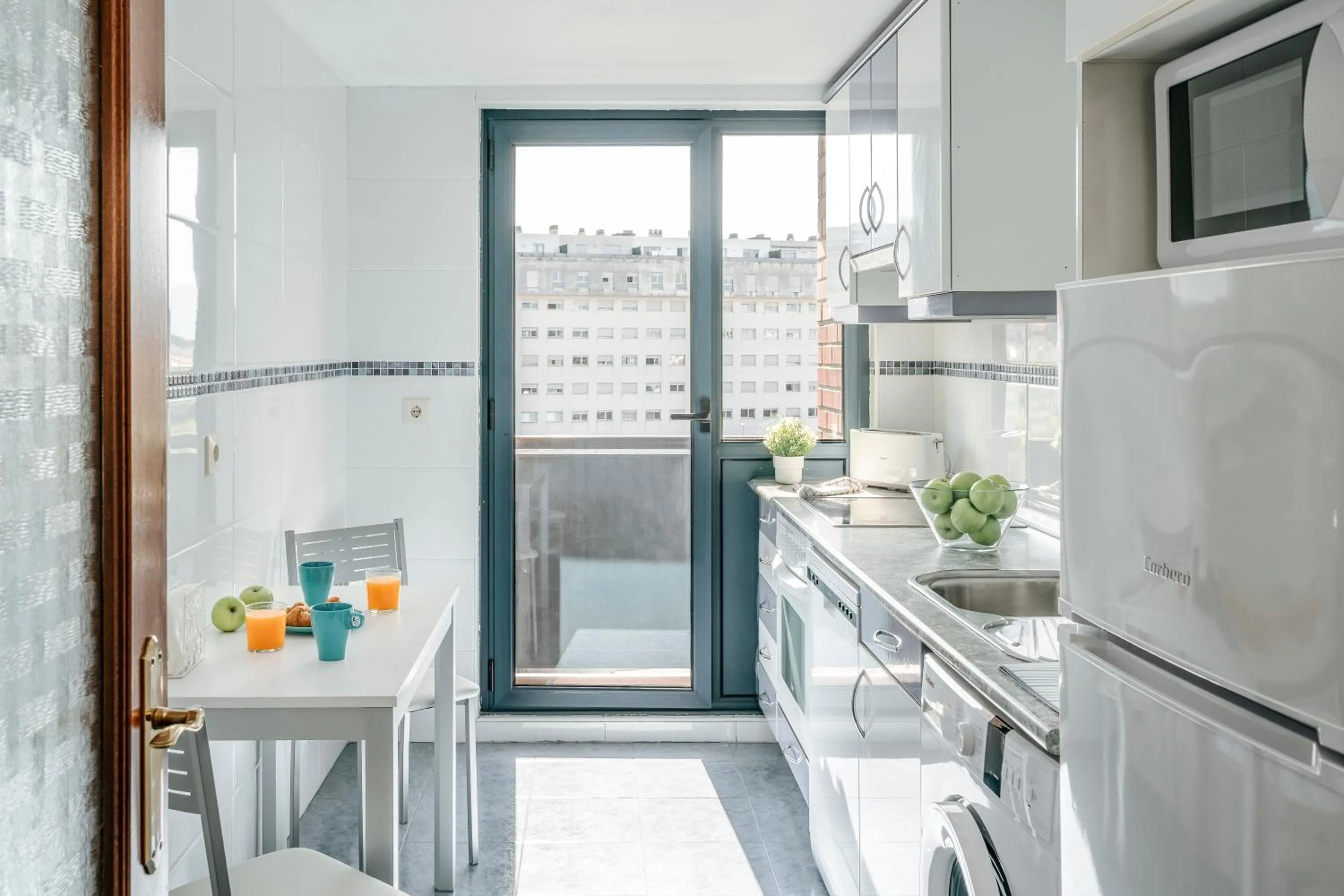 Kitchen or kitchenette in Apartamentos Alday