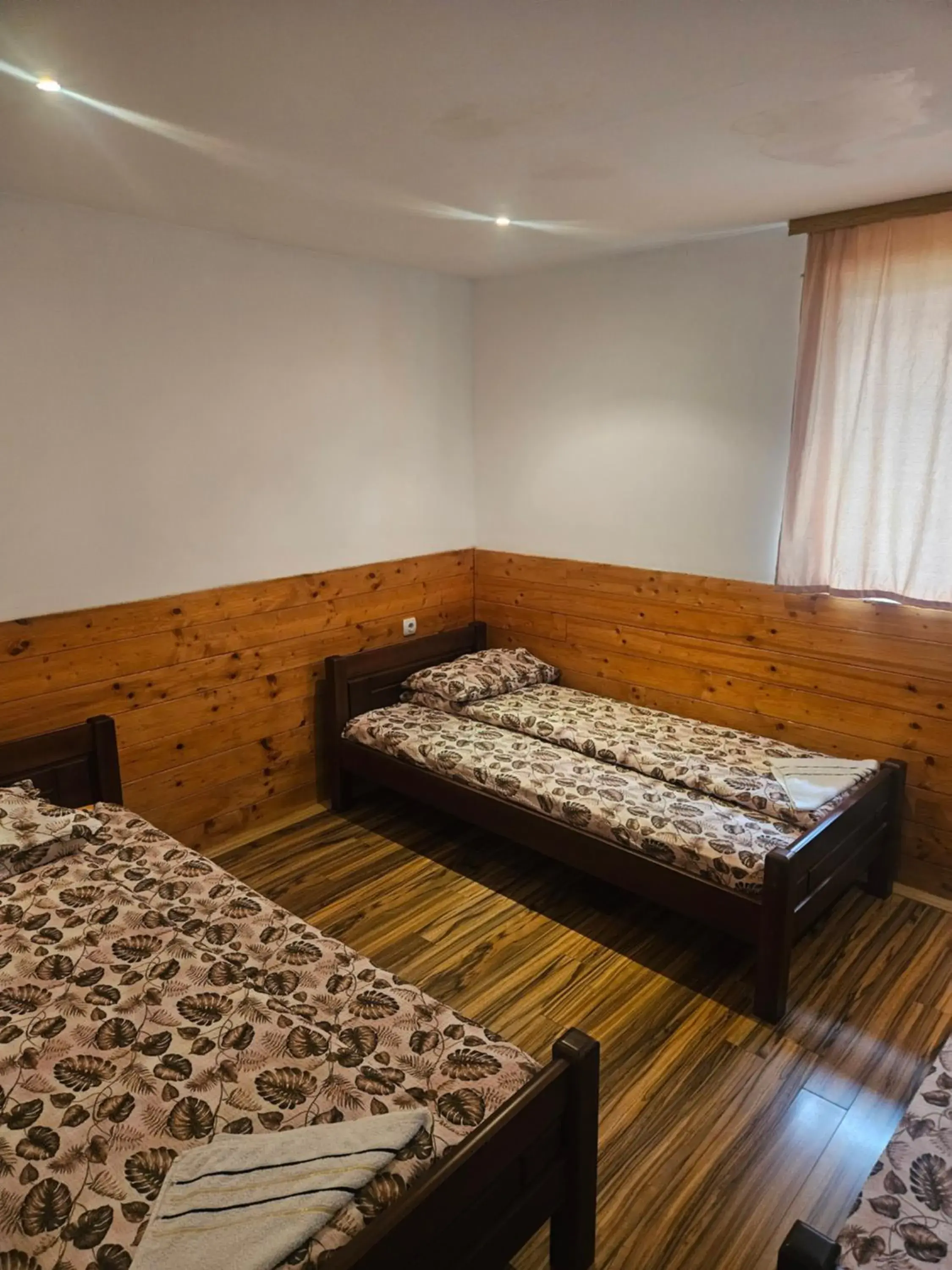 Triple Room with Shared Bathroom in Guest House Ethno Village Milogora Triple Room with Shared Bathroom in Guest House Ethno Village Milogora