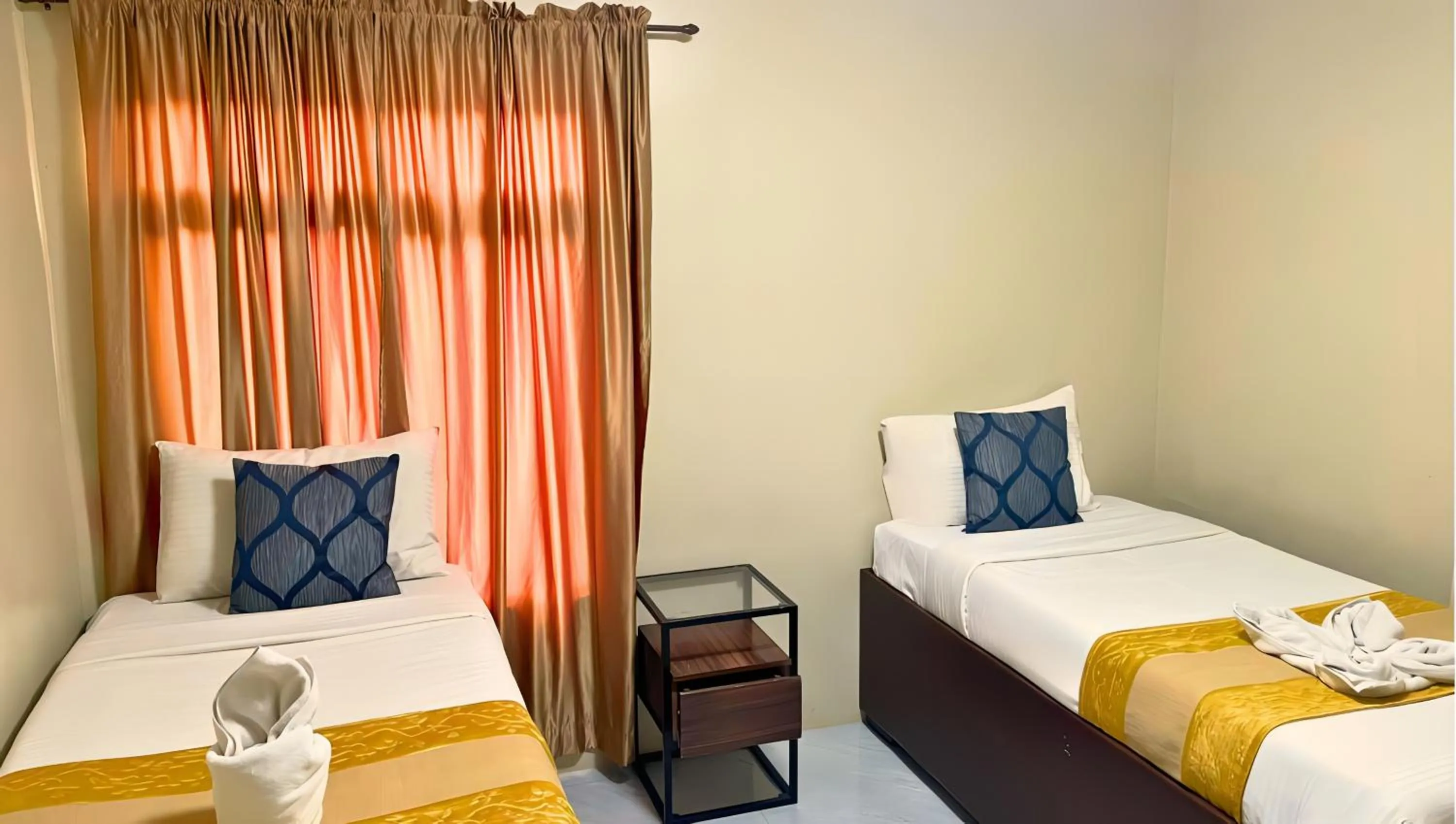 Bed in Algers Suites