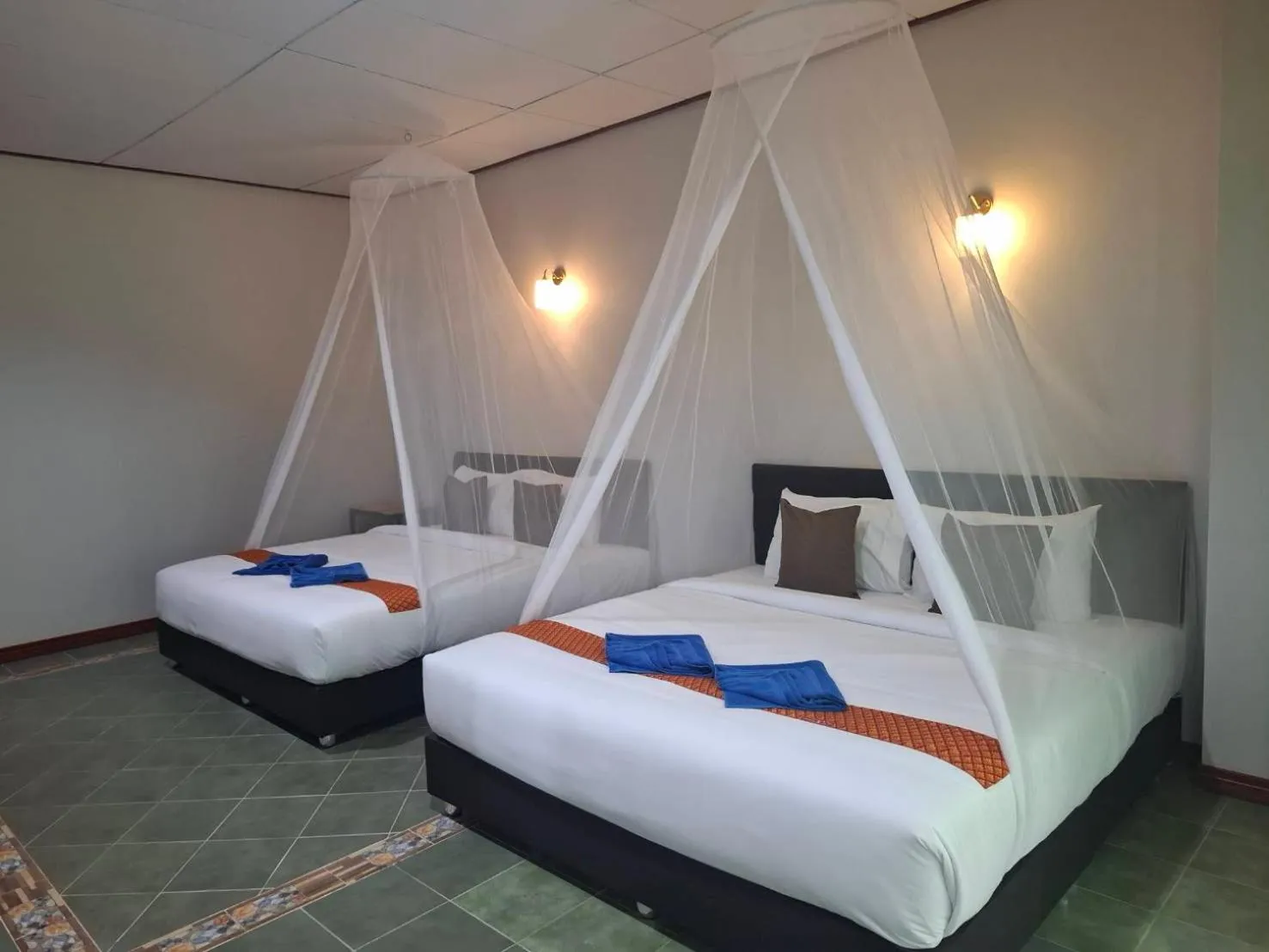 Bed in Tree Tops River Huts