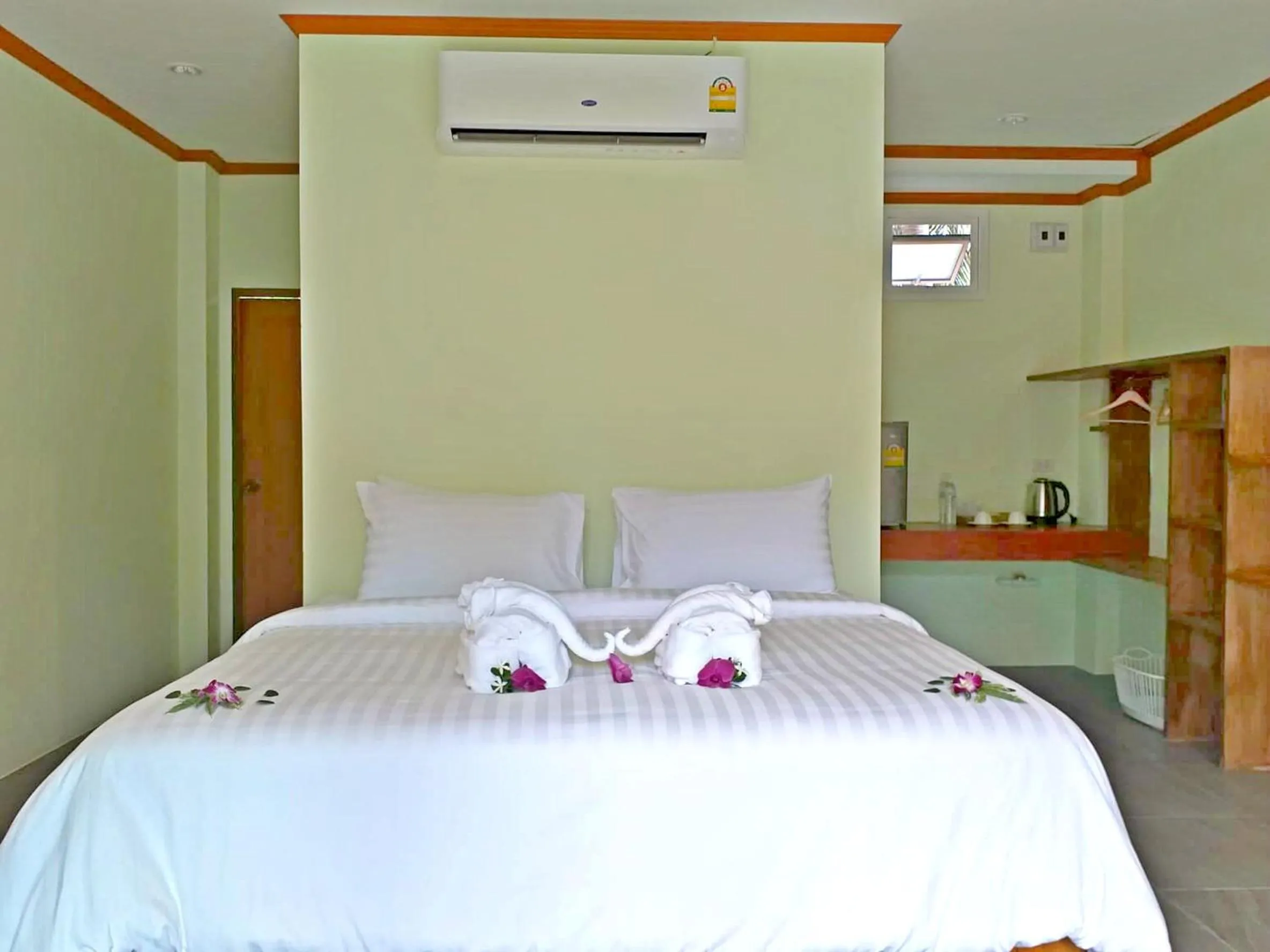 Bed in The Ford SunSet Beach Resort