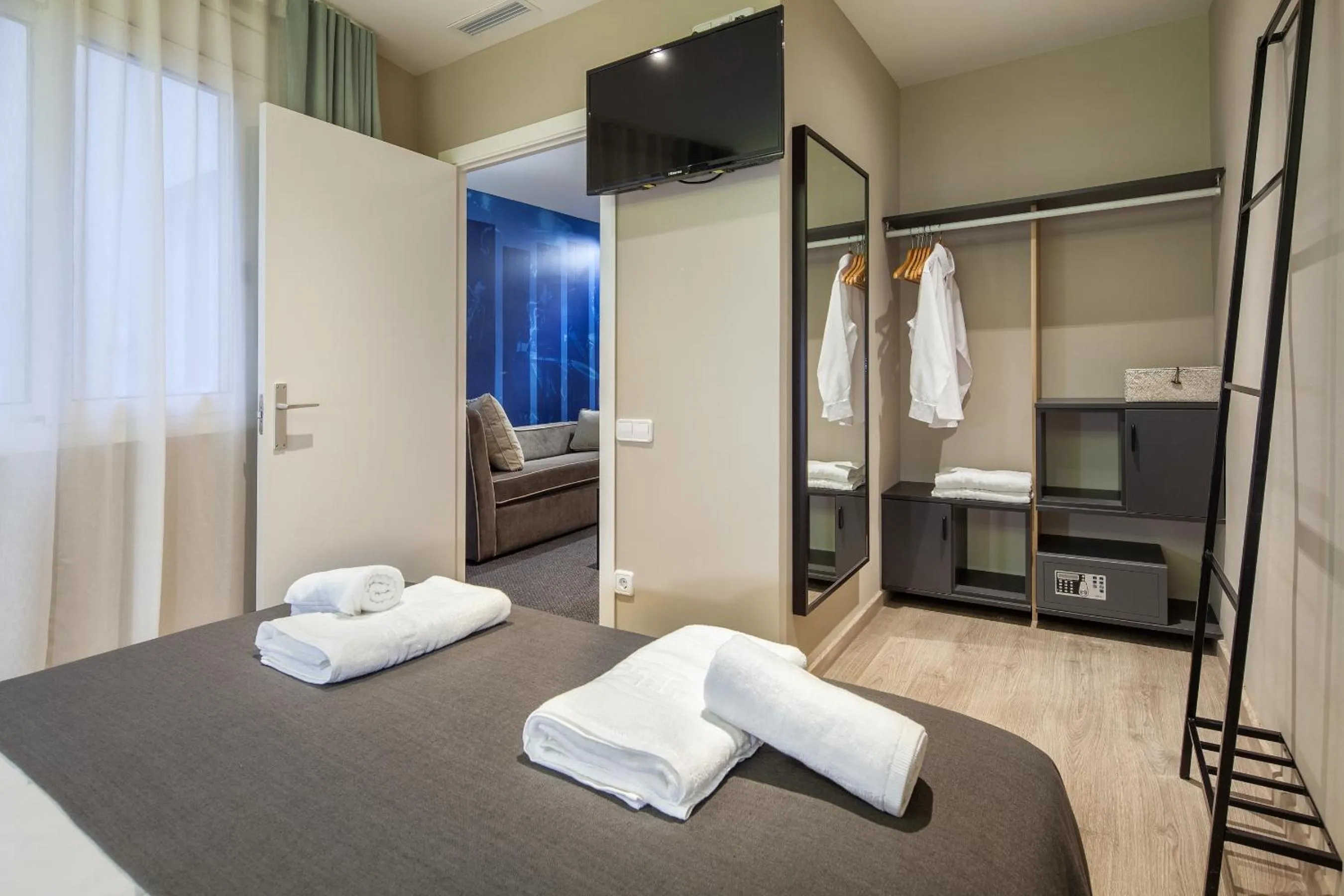 Bedroom, Bed in Habitat Apartments Cool Jazz